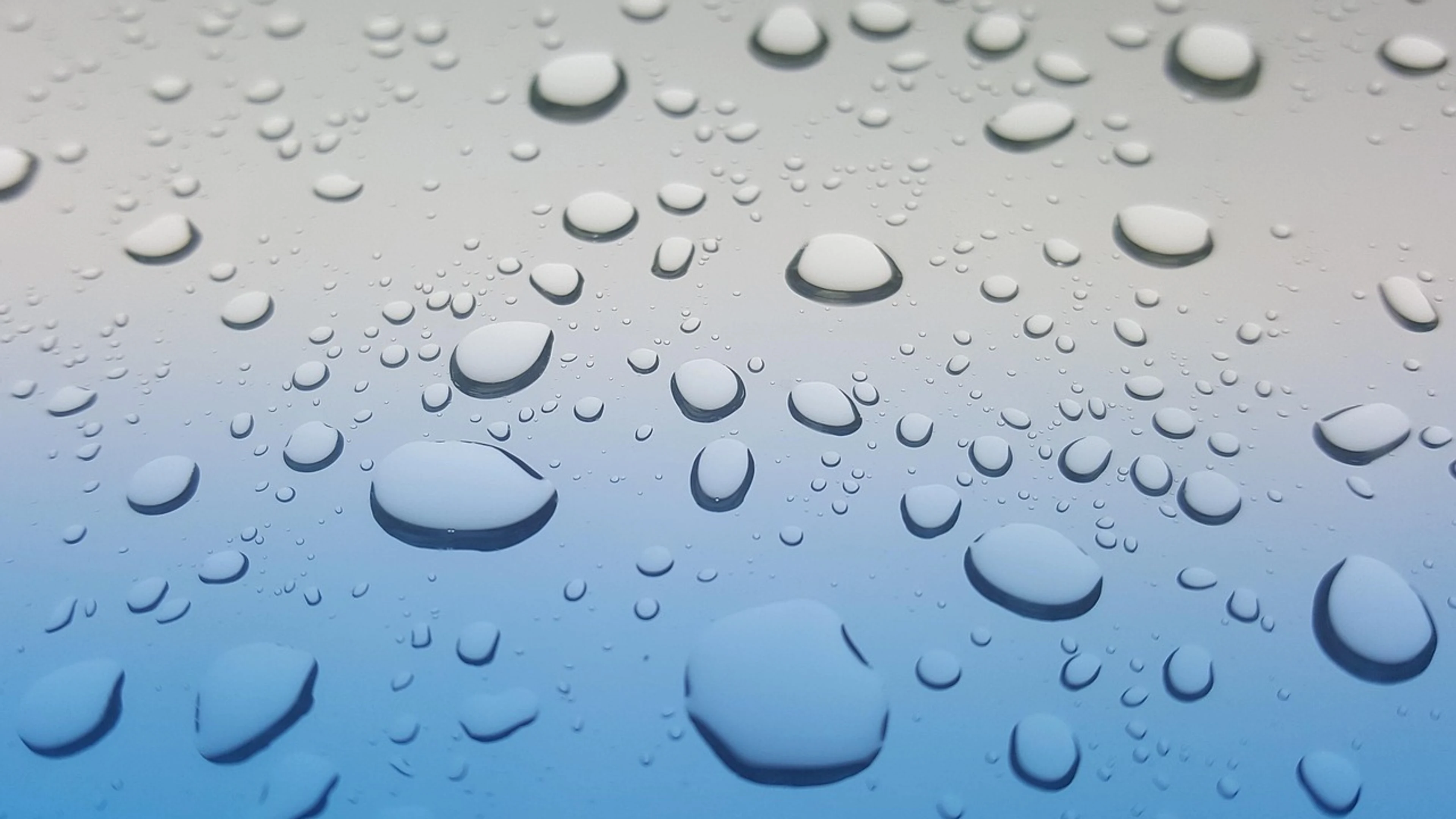Rain drops surface wet - free 4K Ultra HD abstract wallpaper for desktop