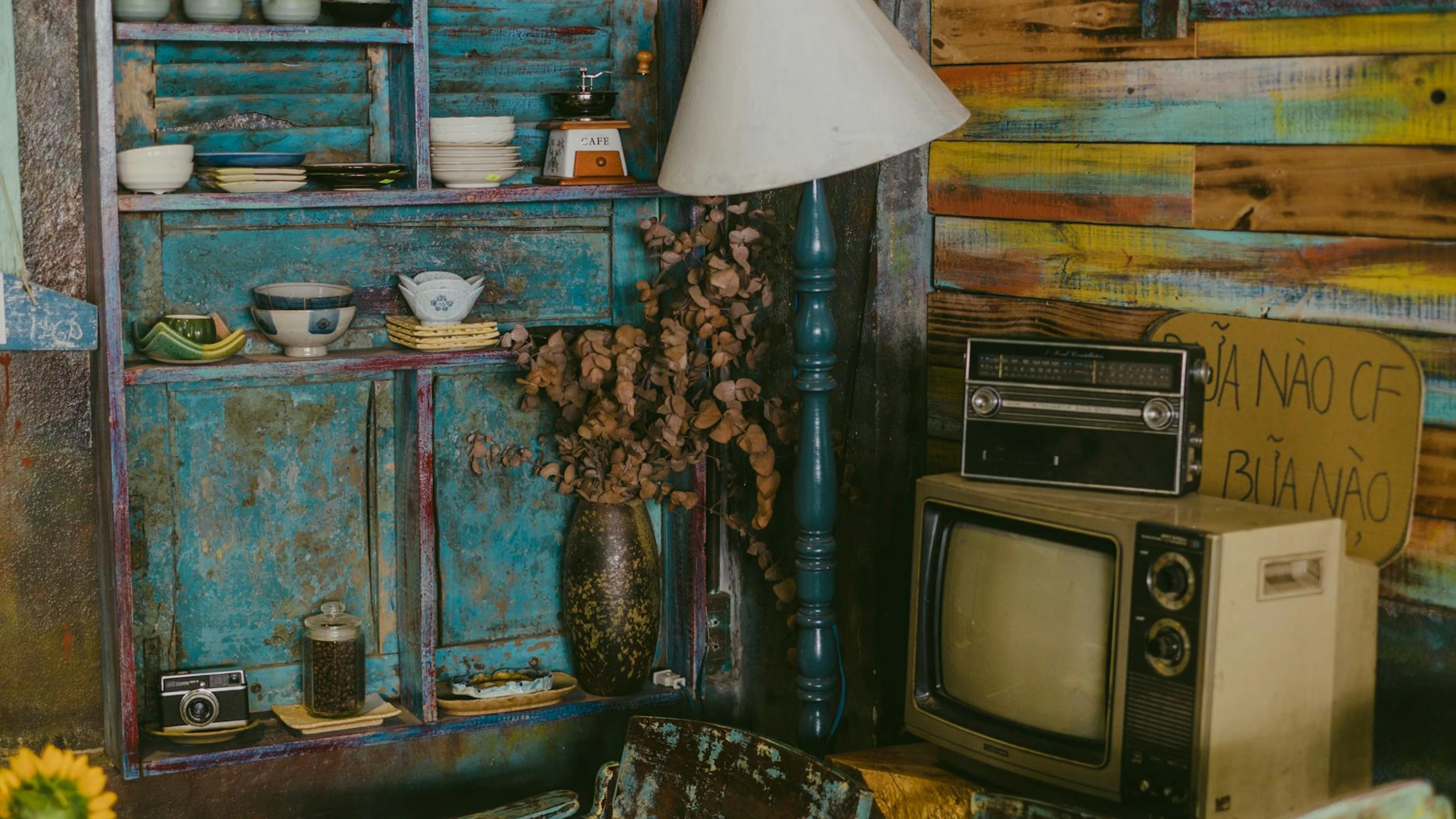 A vintage interior featuring retro TV, camera, and rustic decor elements for a n - free 4K Ultra HD aesthetic wallpaper for desktop