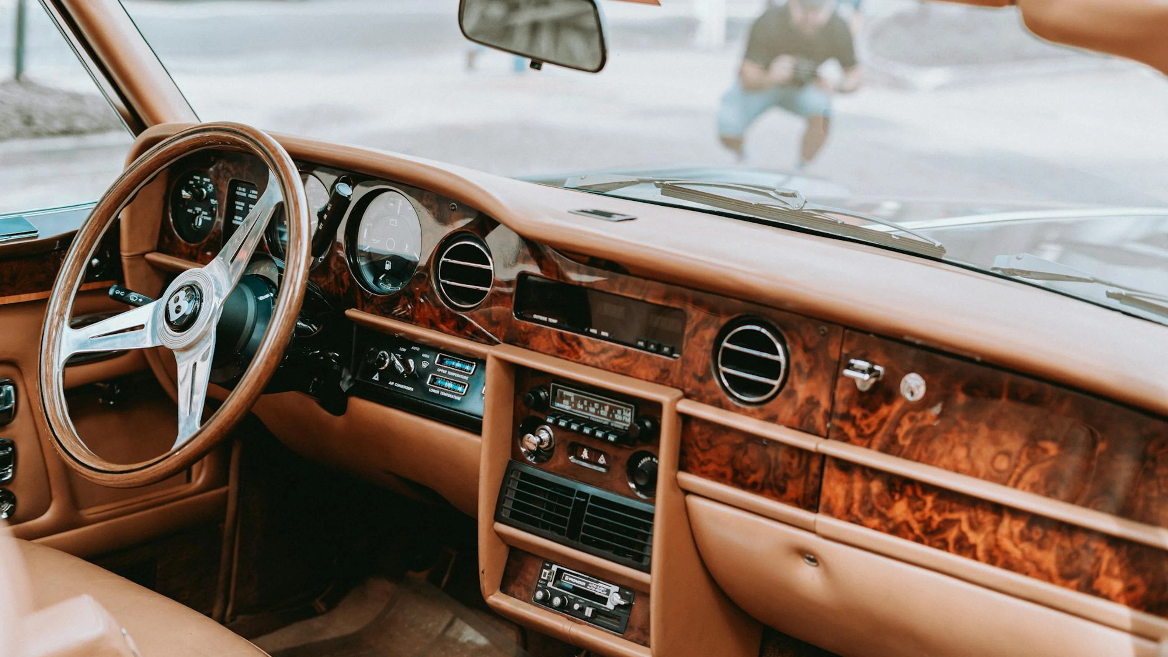 Explore the opulent wooden dashboard and leather seats of a vintage luxury car i - free 4K Ultra HD architecture wallpaper for desktop