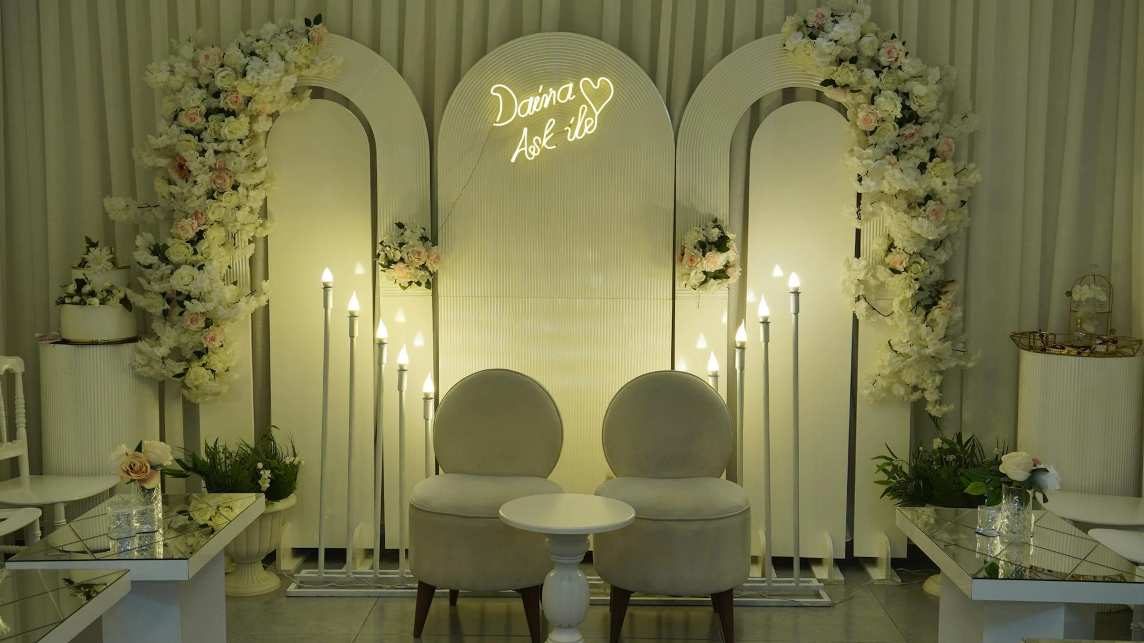 Sophisticated wedding ceremony setup with floral arrangements and elegant lighti - free 4K Ultra HD architecture wallpaper for desktop