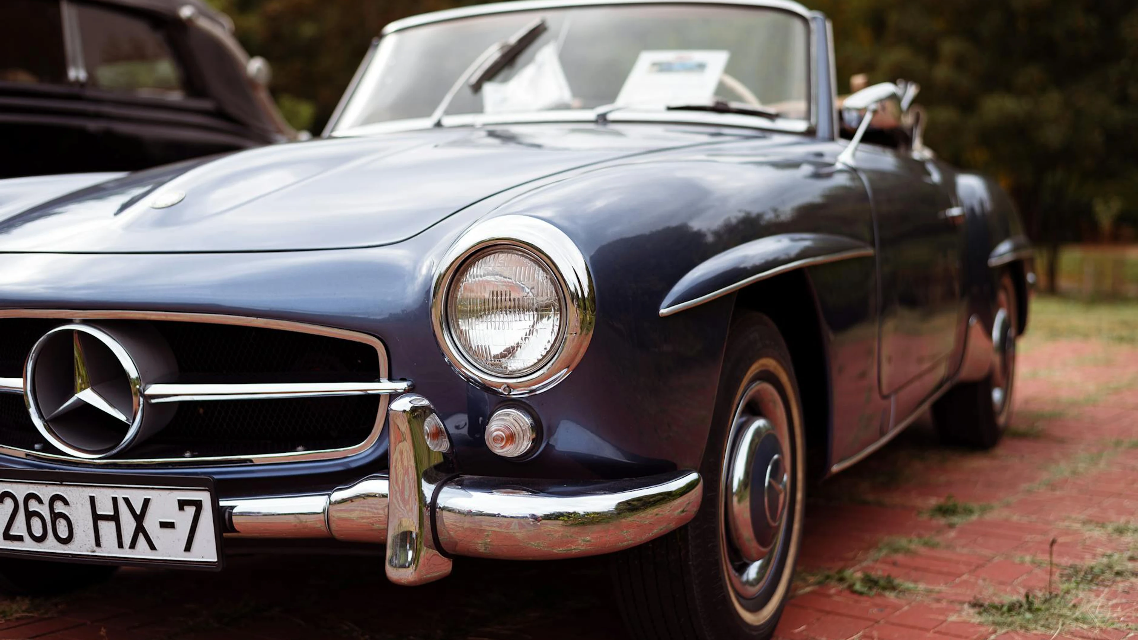 Classic Mercedes convertible showcased outdoors, featuring sleek design and chro - free 4K Ultra HD cars wallpaper for desktop