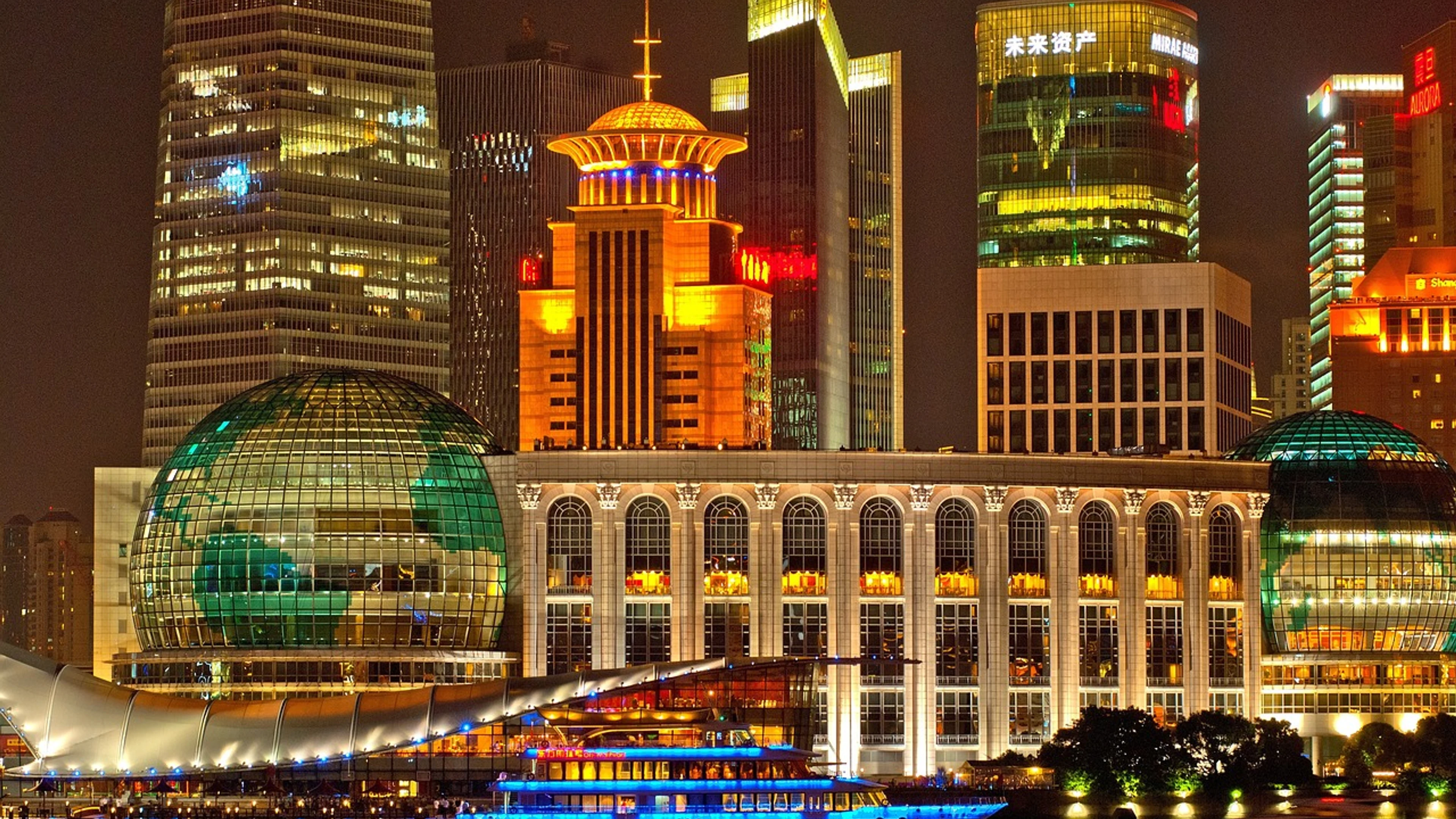 Buildings illuminated city - free 4K Ultra HD city wallpaper for desktop