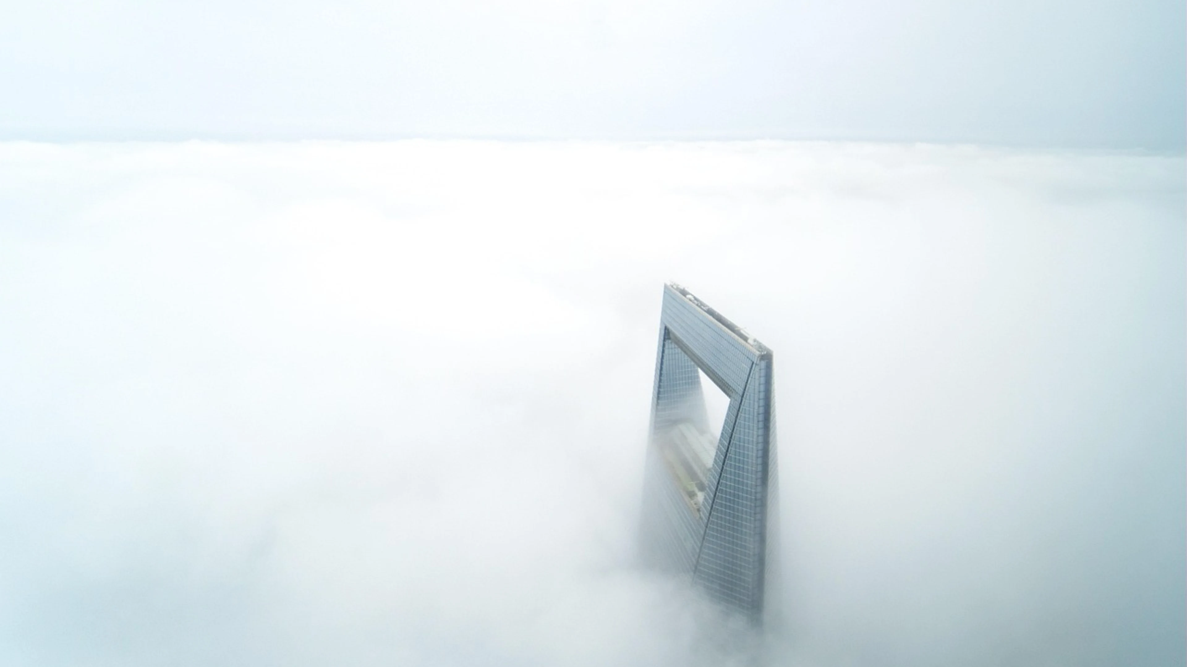 Shanghai world financial center clouds - free 4K Ultra HD city wallpaper for desktop