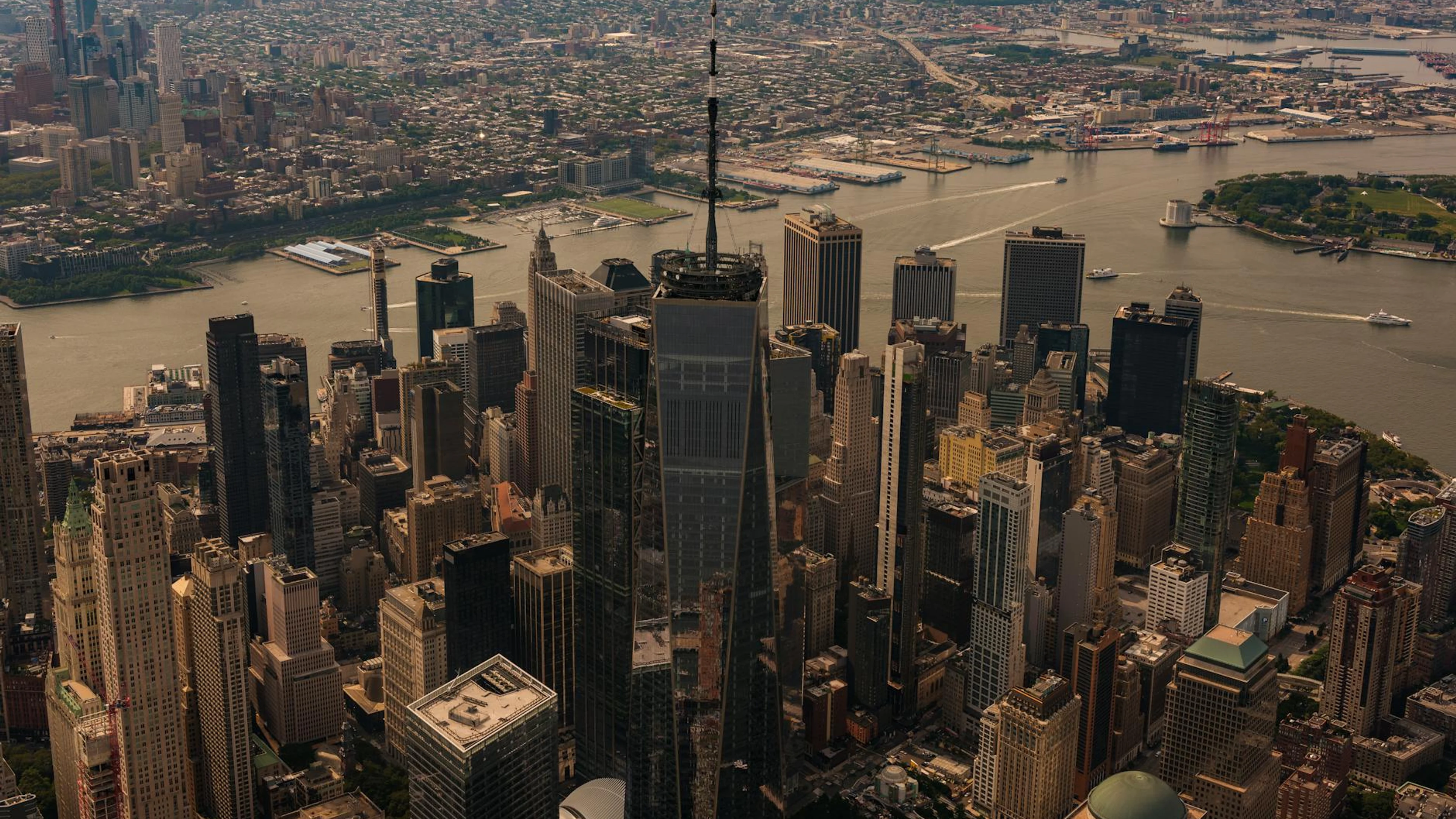 Stunning aerial photo capturing Manhattan skyline overlooking the Hudson River a - free 4K Ultra HD city wallpaper for desktop