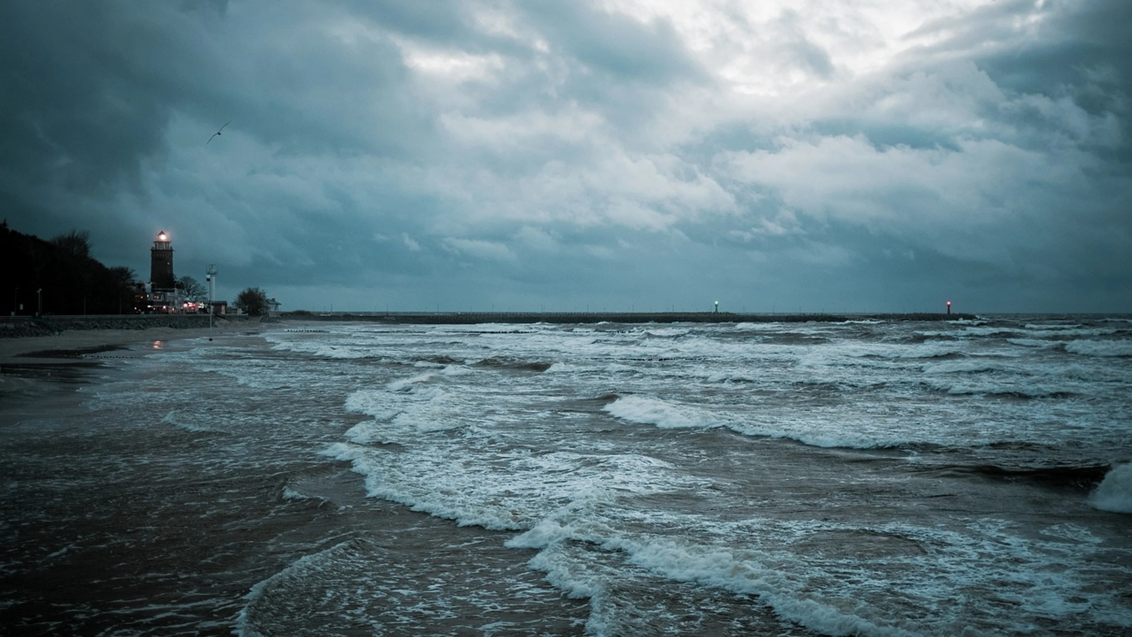 Monolithic part of the waters sea the coast - free 4K Ultra HD dark wallpaper for desktop