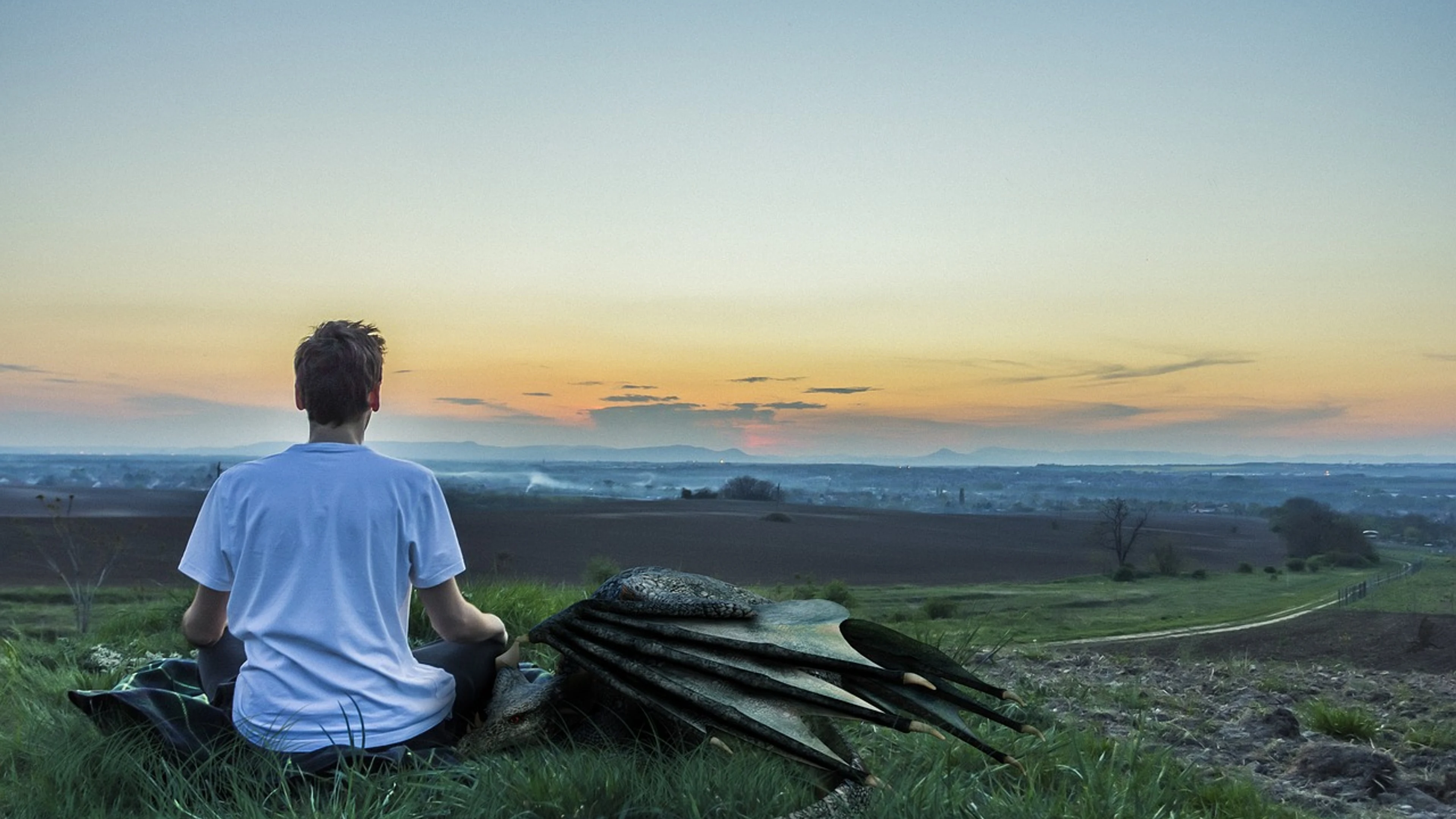 Boy dragon sunset - free 4K Ultra HD fantasy wallpaper for desktop