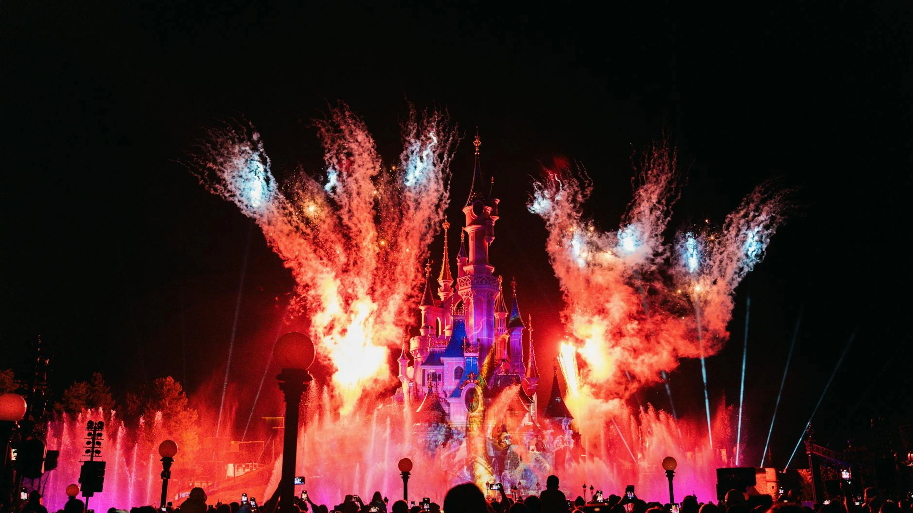 Magical fireworks display over Sleeping Beauty Castle at Disneyland Paris, Franc - free 4K Ultra HD fantasy wallpaper for desktop