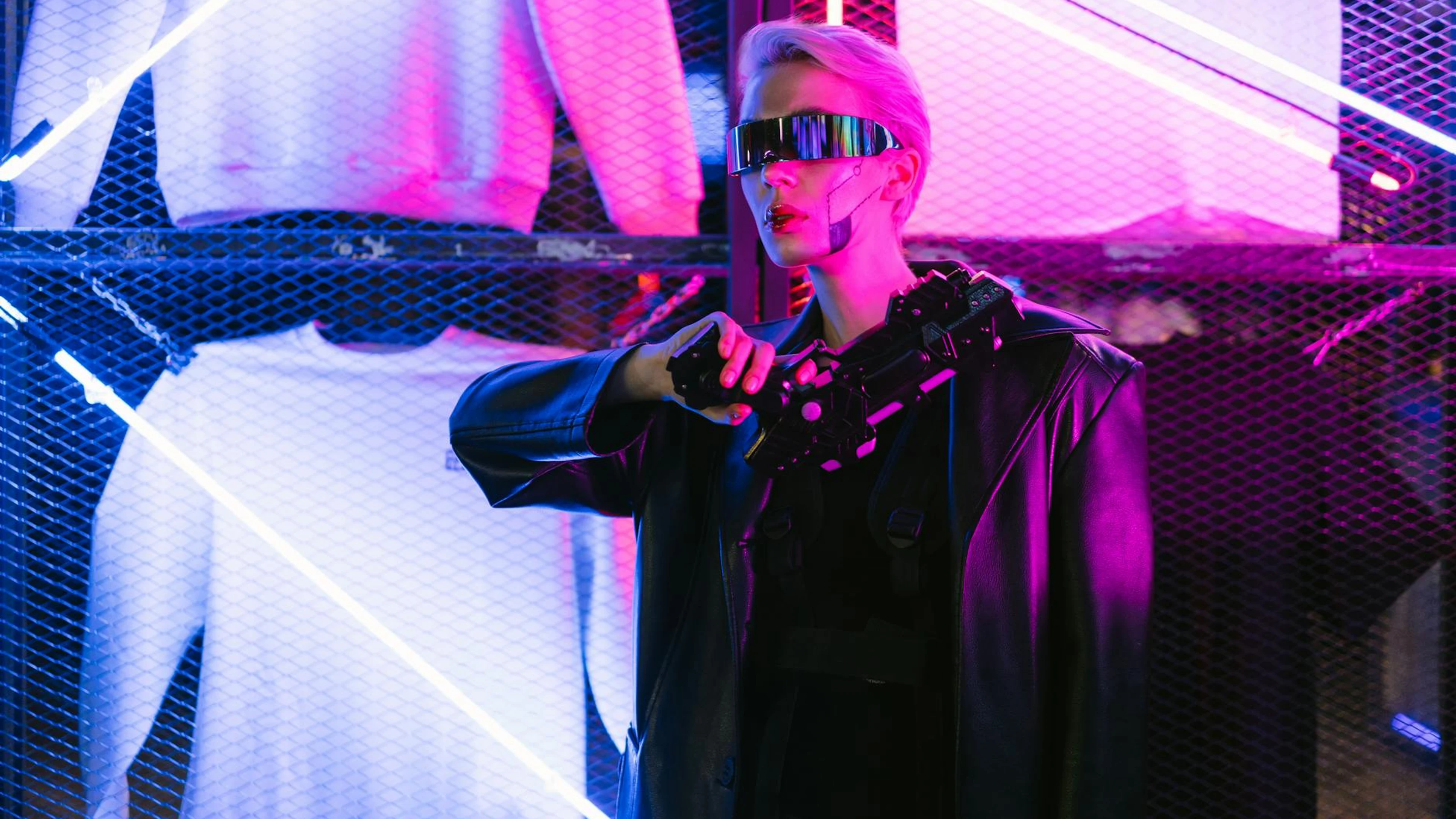 A futuristic woman in a cyberpunk outfit with neon lights and eyewear. - free 4K Ultra HD gaming wallpaper for desktop