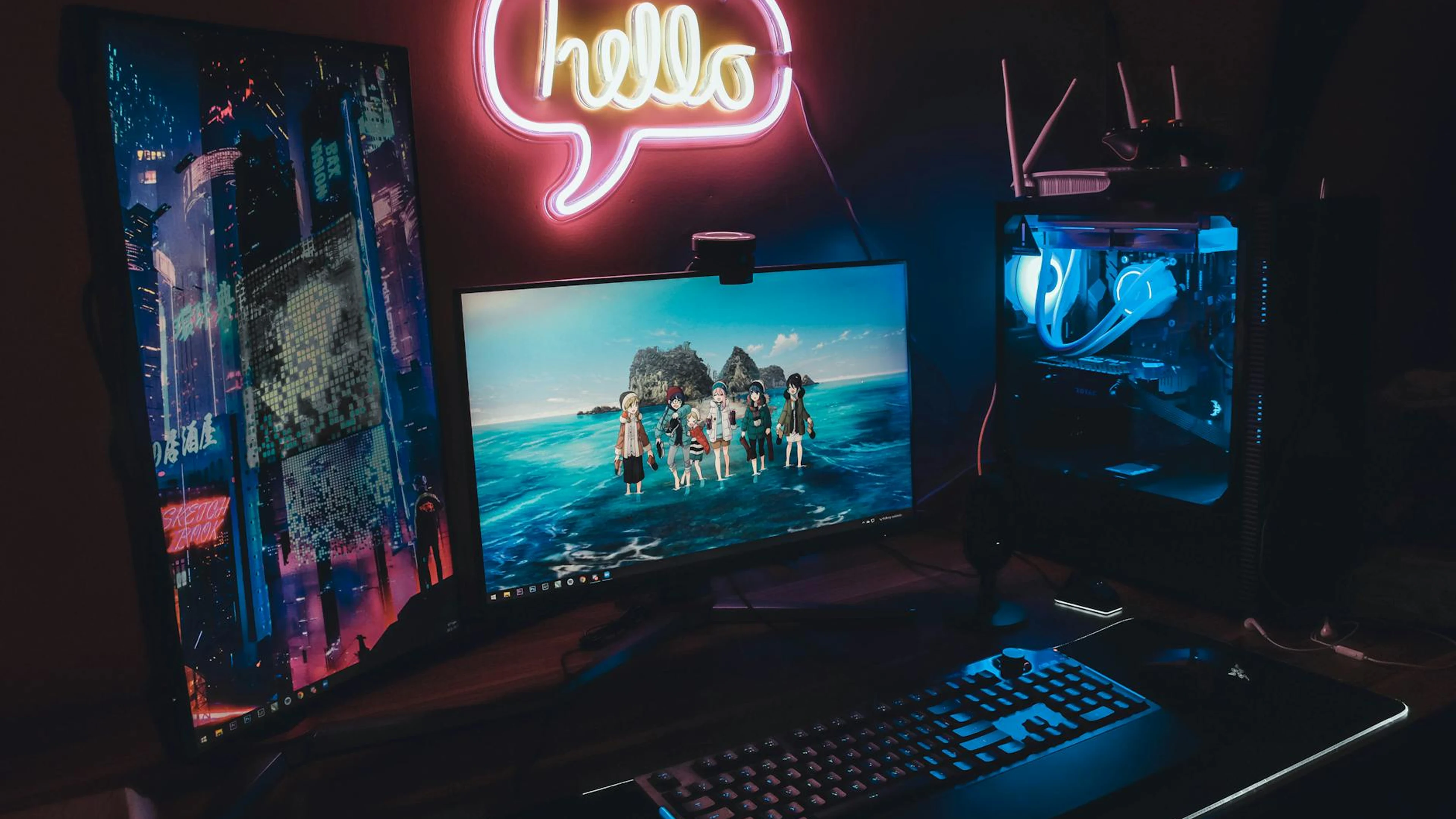 A sleek gaming setup with neon 'hello' sign, dual monitors, and illuminated PC f - free 4K Ultra HD gaming wallpaper for desktop