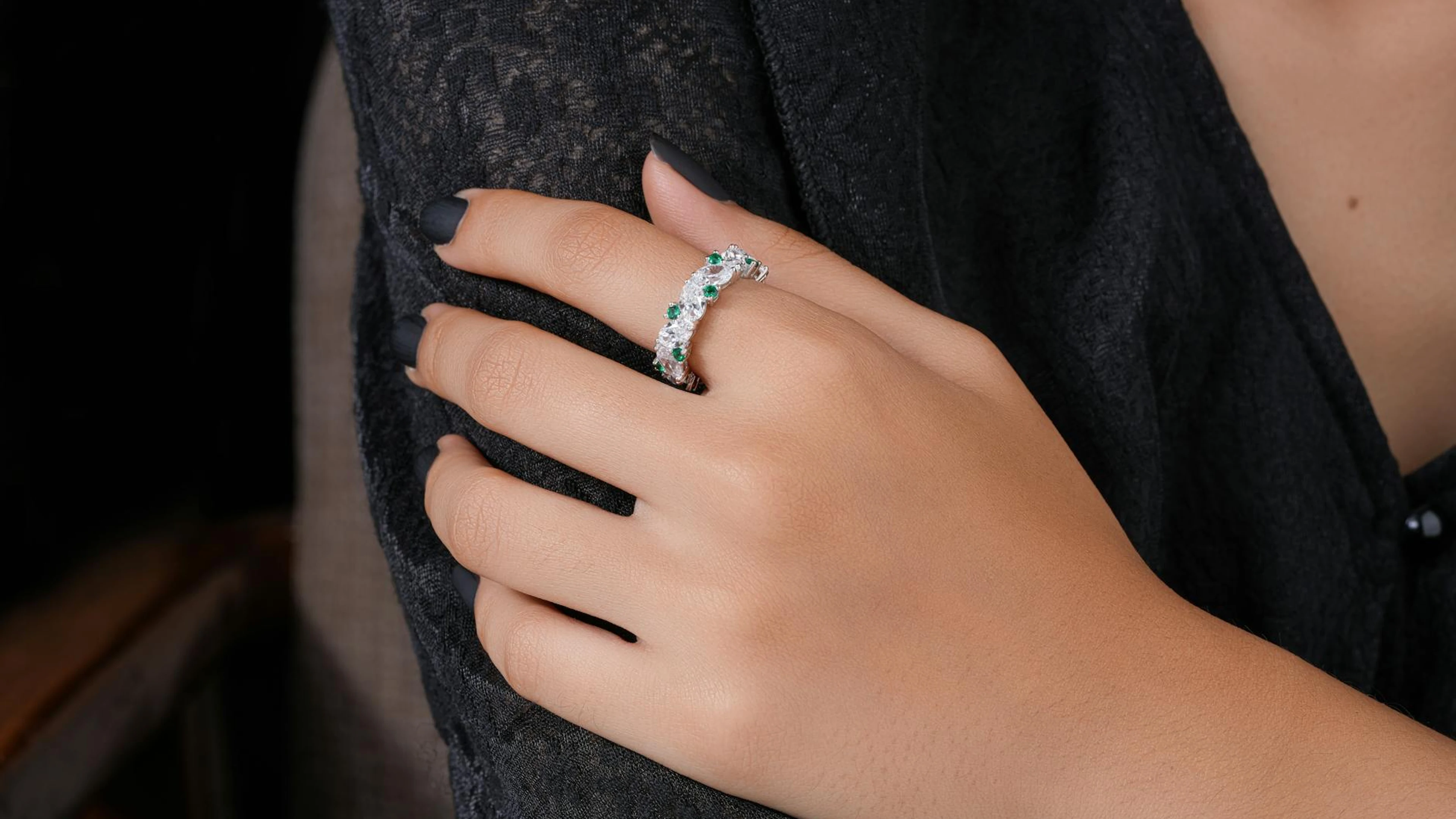 Close-up of a hand adorned with a sparkling diamond ring, showcasing fine jewelr - free 4K Ultra HD gaming wallpaper for desktop