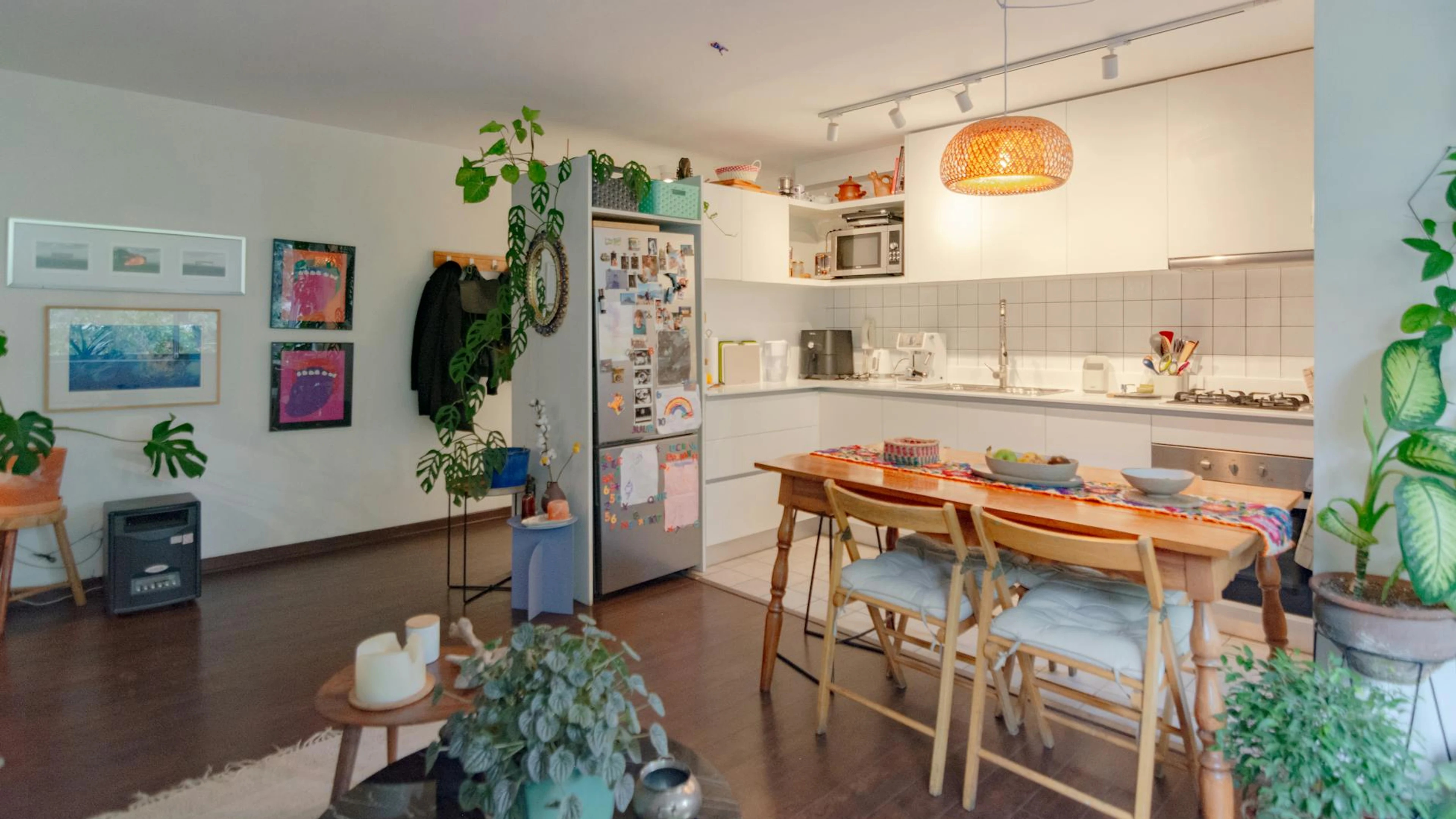 A stylish kitchen and dining area with contemporary design and abundant natural - free 4K Ultra HD minimal wallpaper for desktop