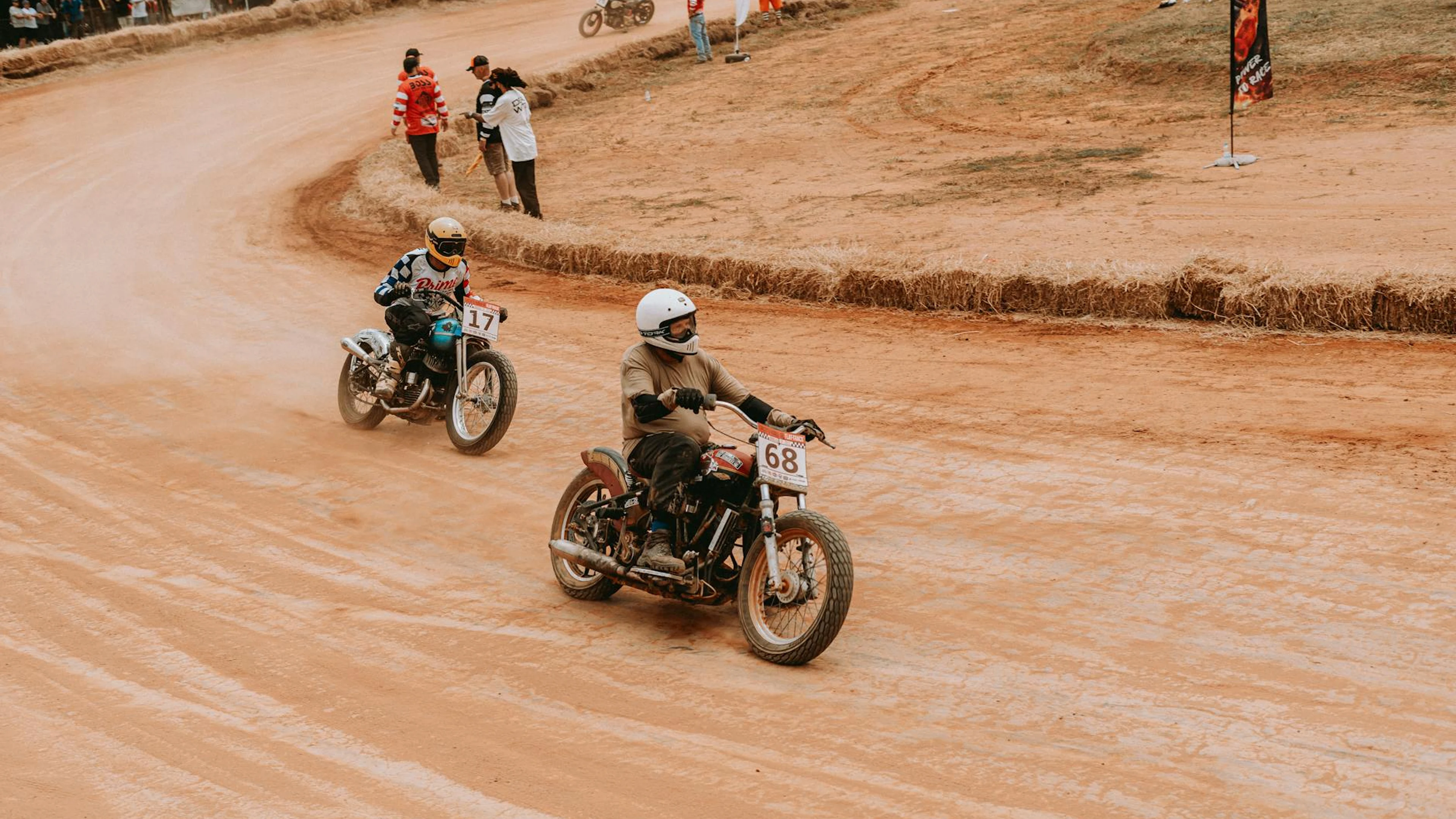 Riders compete in a thrilling vintage motorcycle dirt track race. - free 4K Ultra HD motorcycle wallpaper for desktop
