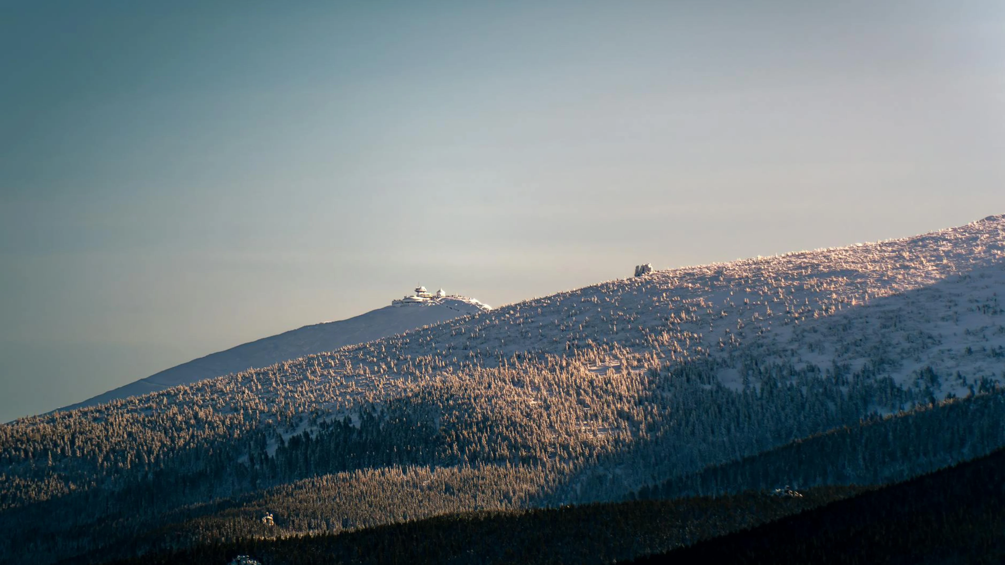Breathtaking sunrise view of the Karkonosze mountain range in winter, showcasing - free 4K Ultra HD mountain wallpaper for desktop