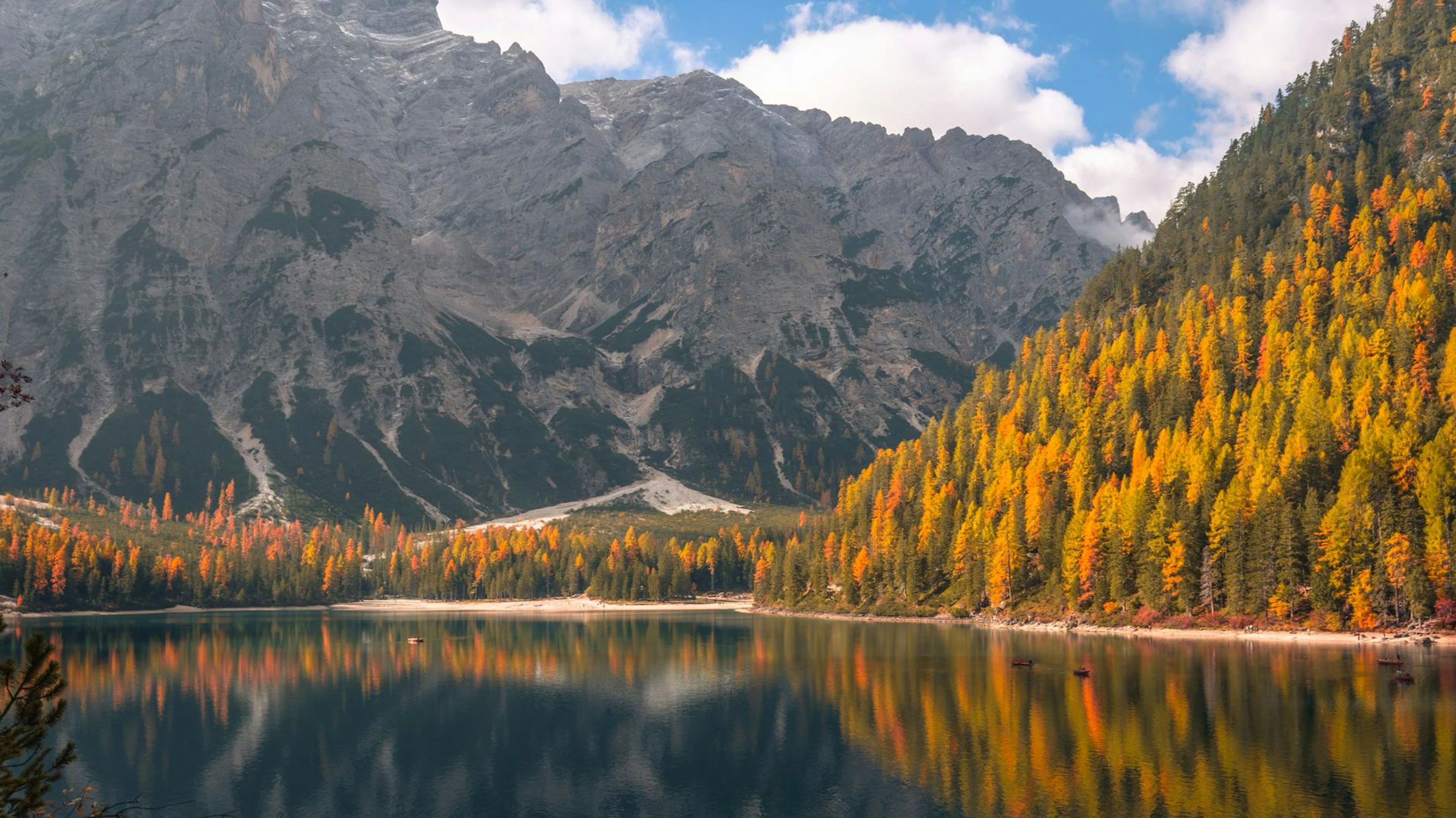 Stunning autumn landscape of Trentino mountains reflected in a serene lake, show - free 4K Ultra HD mountain wallpaper for desktop