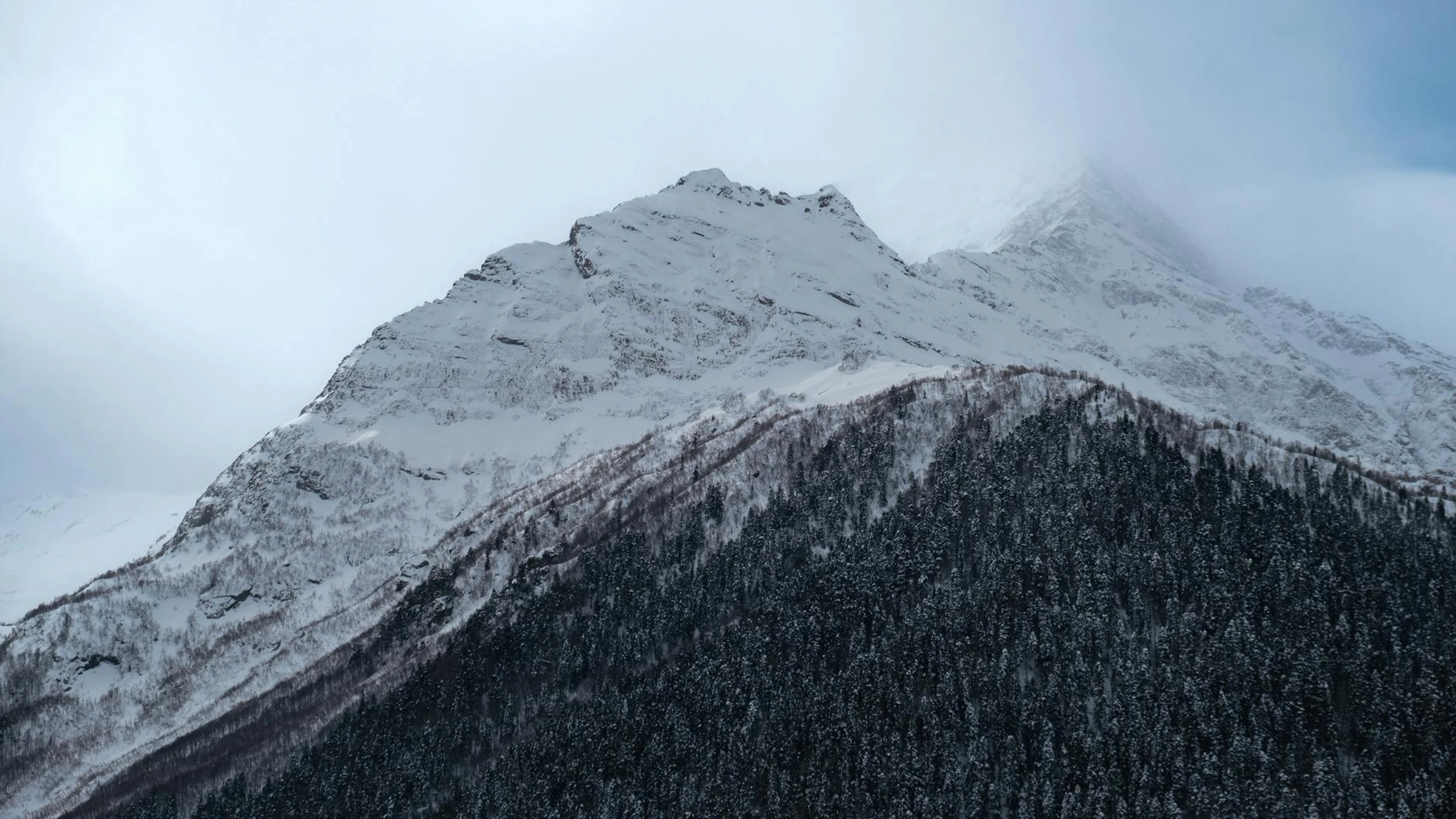 Breathtaking view of snow-covered mountains in Dombay, Russia - perfect winter l - free 4K Ultra HD nature wallpaper for desktop