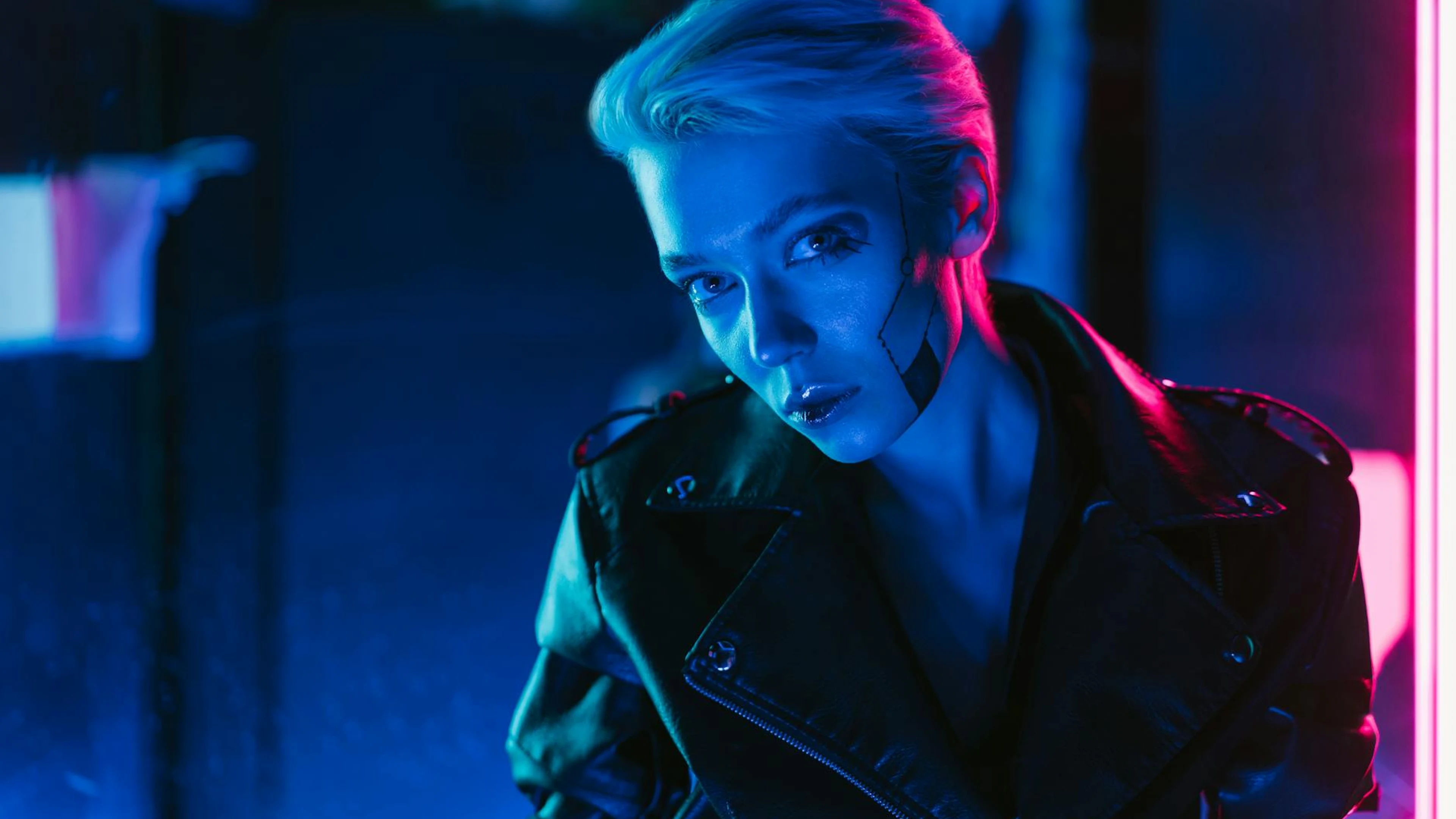 A striking portrait of a woman with cyberpunk makeup under vibrant neon lights, - free 4K Ultra HD neon wallpaper for desktop
