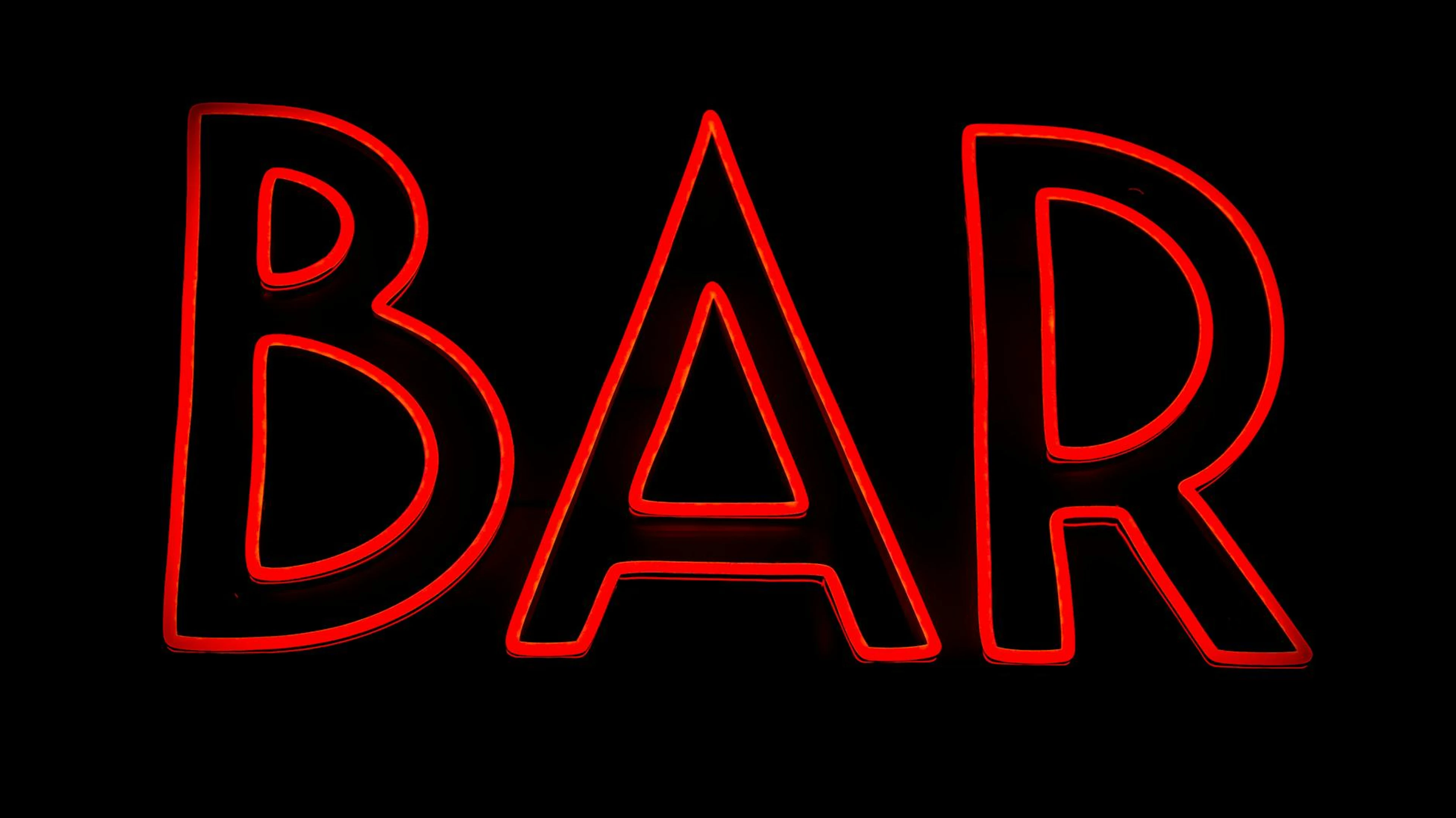 Bright red neon bar sign glowing against a dark backdrop. - free 4K Ultra HD neon wallpaper for desktop