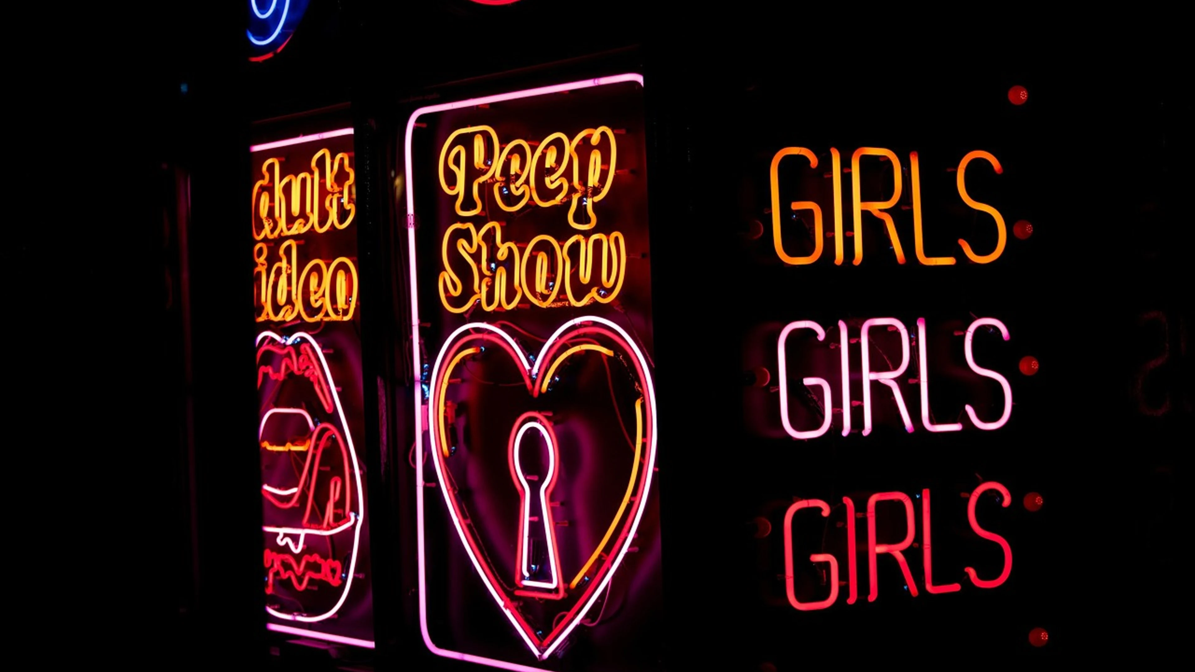 Nightclub peep show neon sign - free 4K Ultra HD neon wallpaper for desktop
