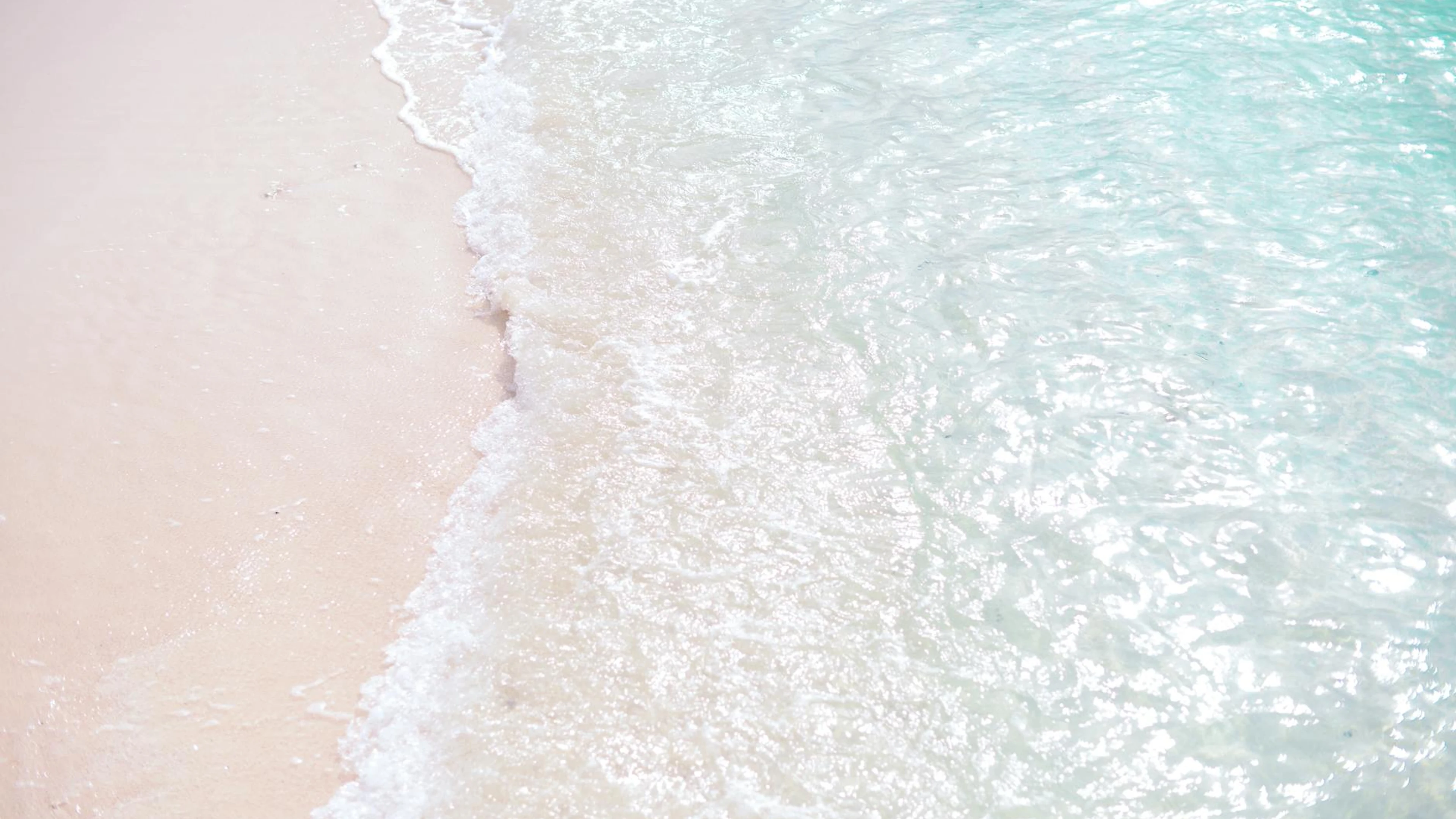 Tranquil scene of waves on a white sand beach, clear turquoise waters. - free 4K Ultra HD ocean wallpaper for desktop