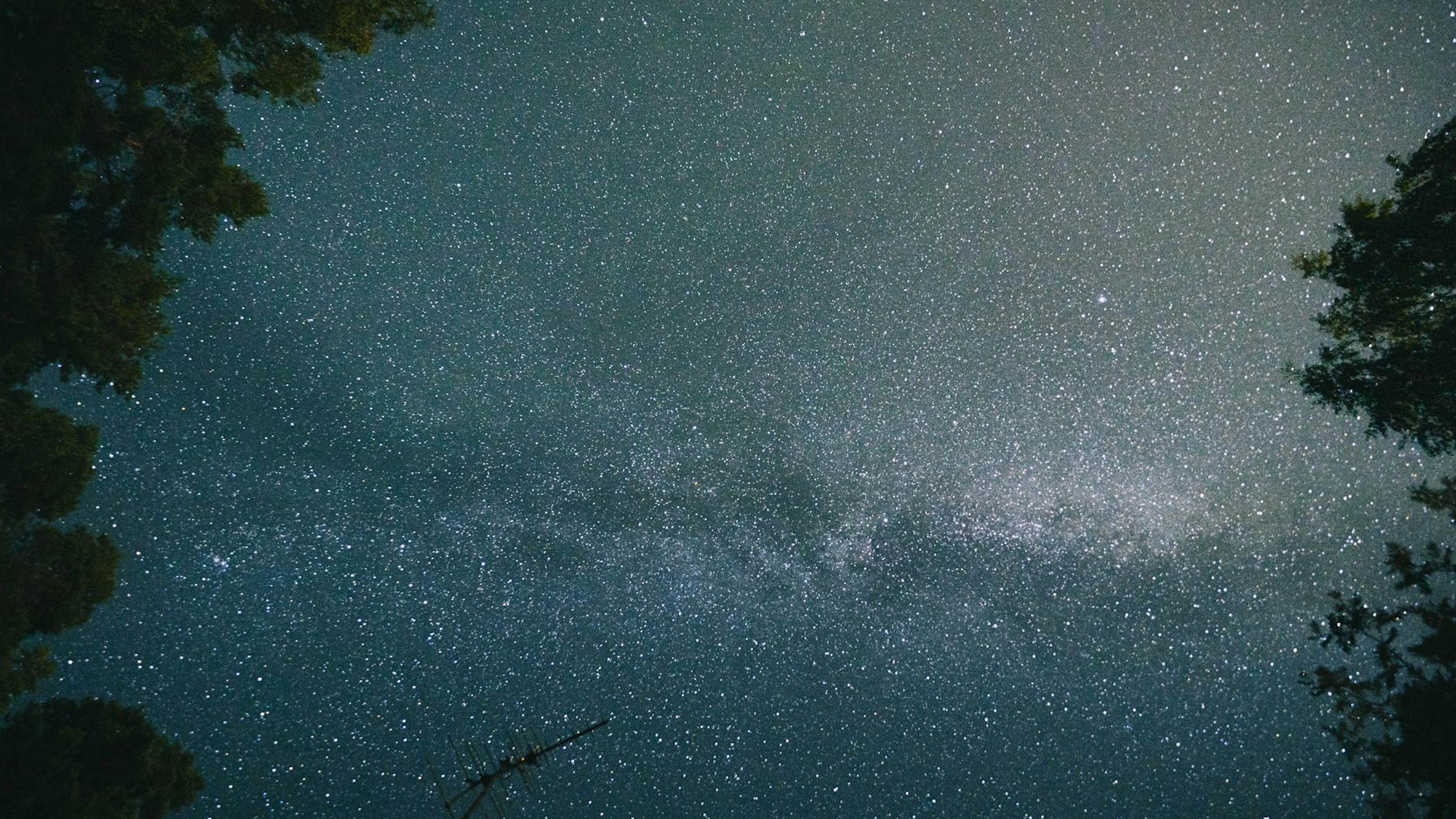 A breathtaking view of the Milky Way galaxy on a clear night with star-filled sk - free 4K Ultra HD space wallpaper for desktop