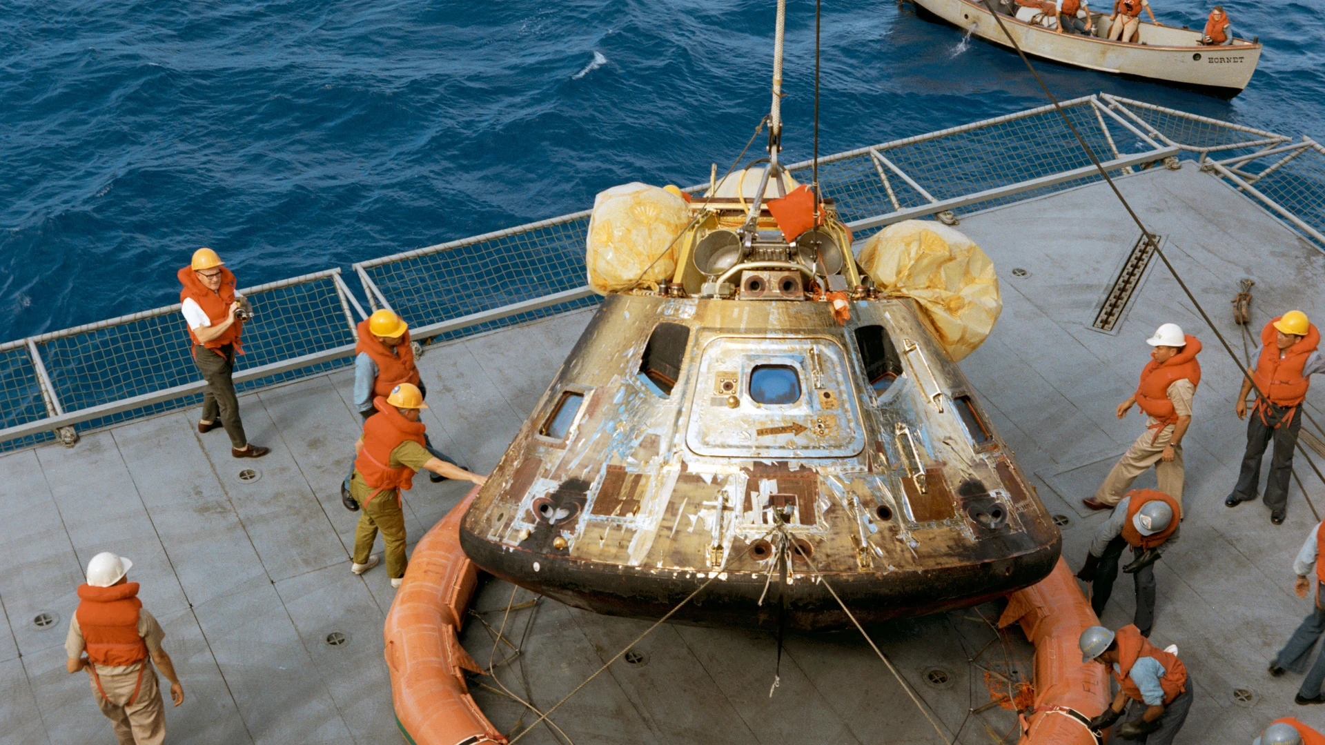Apollo 11 spacecraft Command Module hoisted aboard U.S.S. Hornet - free hd space wallpaper for desktop