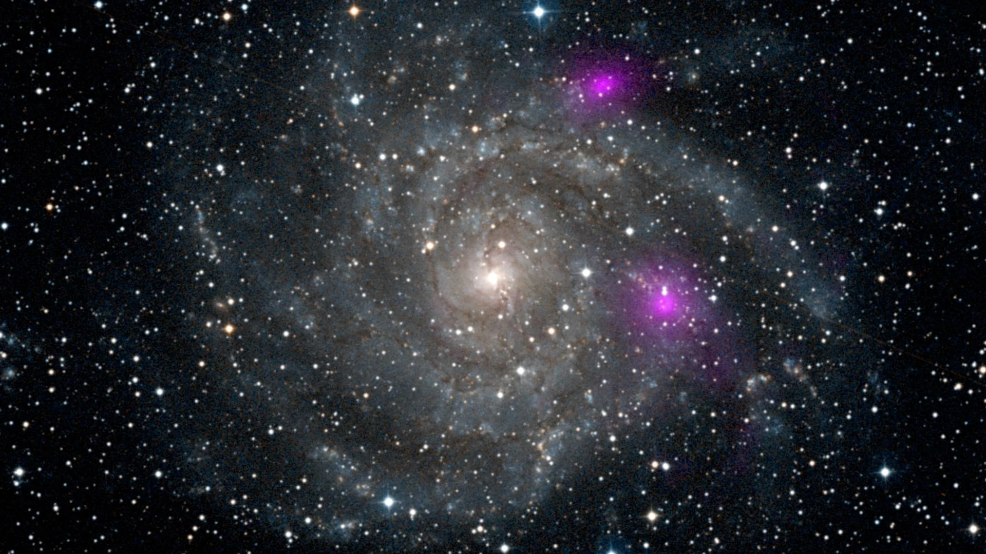 Blazing Black Holes Spotted in Spiral Beauty - free hd space wallpaper for desktop