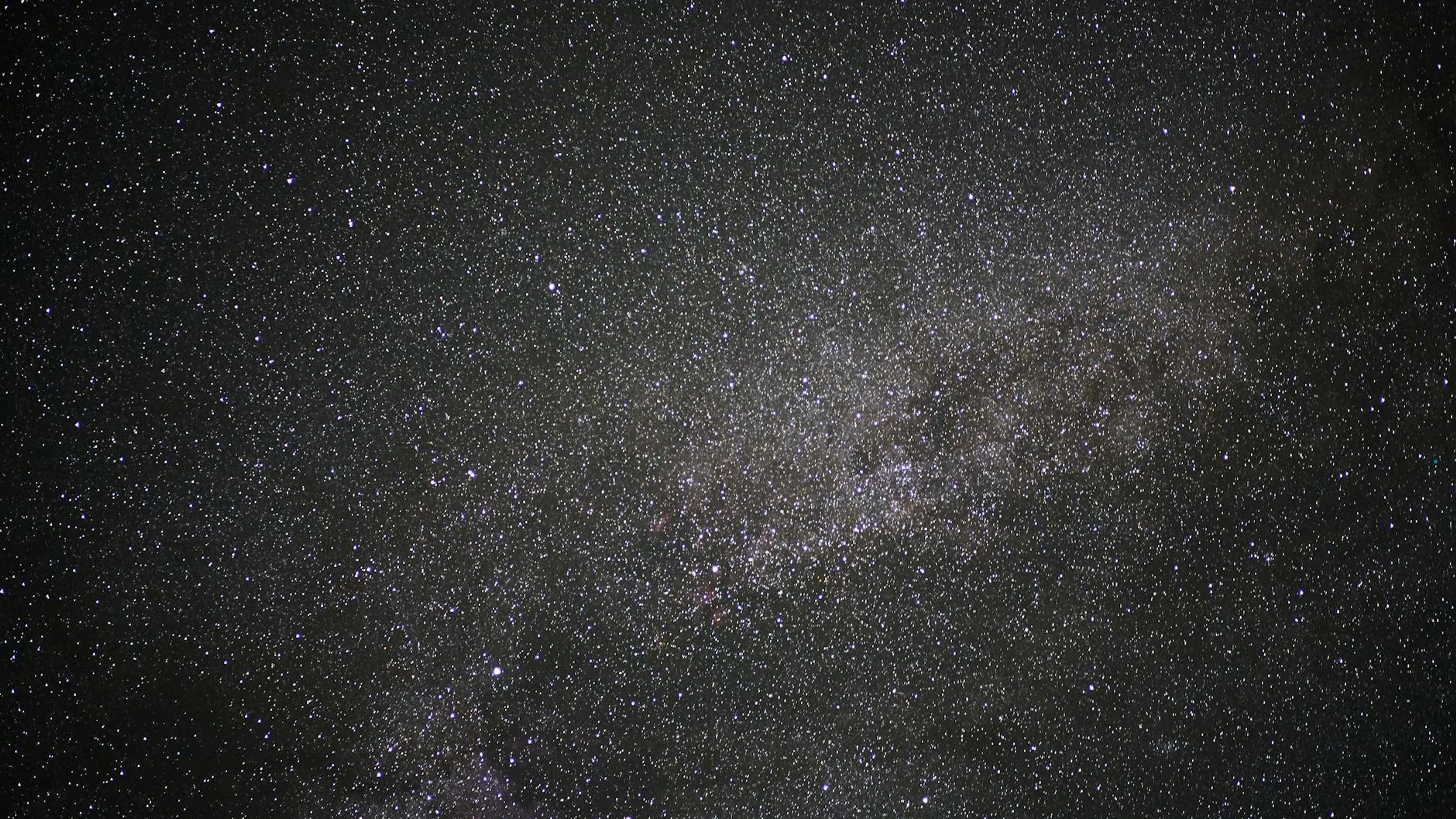 Breathtaking view of a star-filled sky showcasing the Milky Way galaxy. - free 4K Ultra HD space wallpaper for desktop