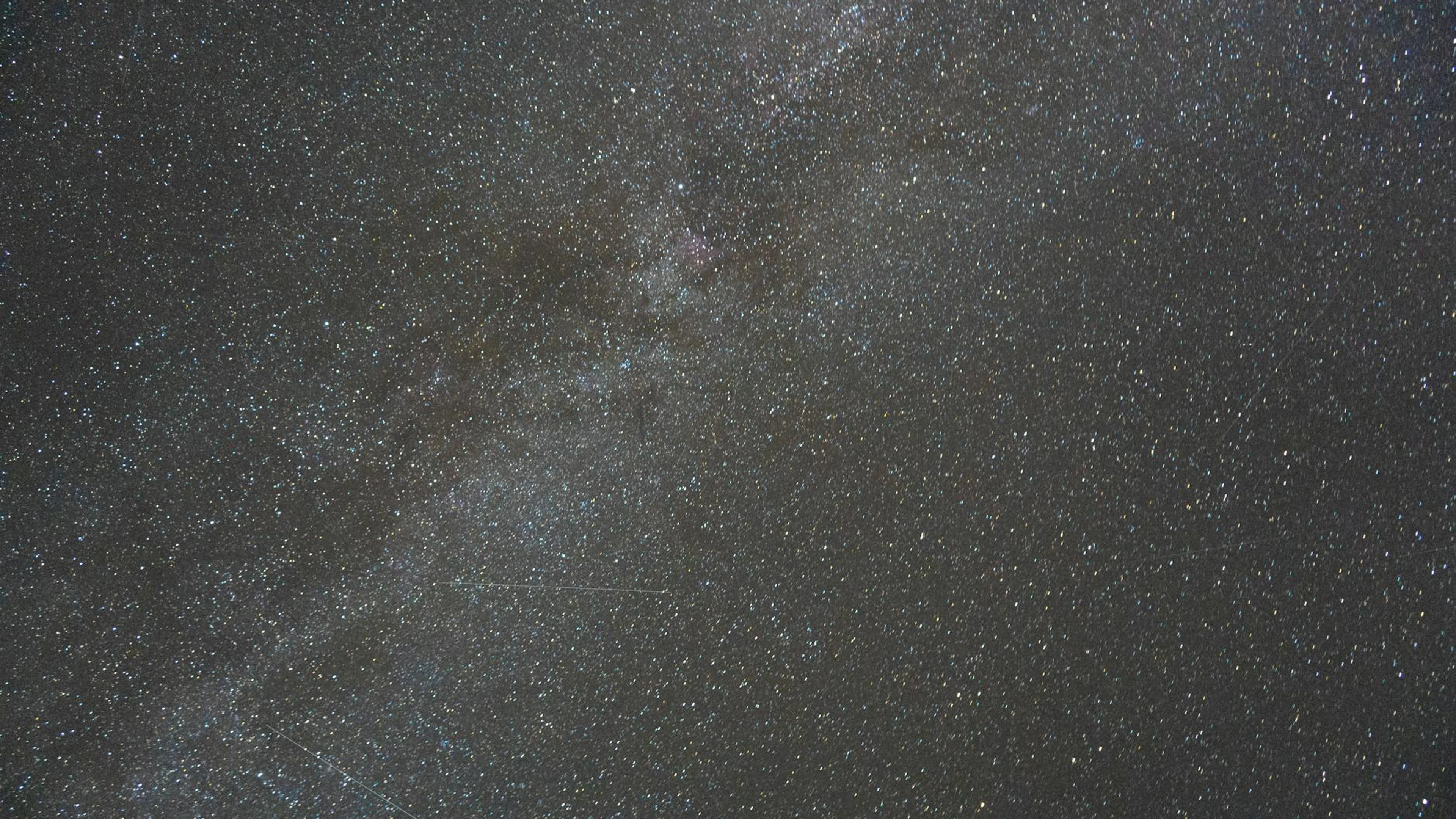 Captivating view of the Milky Way and star-filled night sky, ideal for astronomy - free 4K Ultra HD space wallpaper for desktop