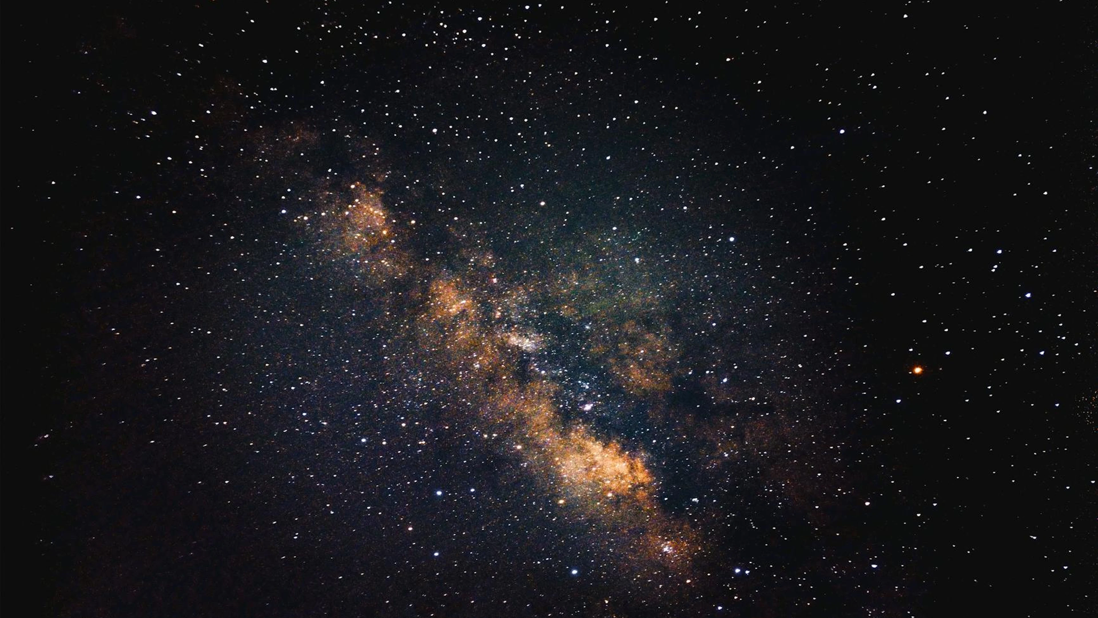 Capture of the Milky Way galaxy rich with stars against a dark night sky, showca - free 4K Ultra HD space wallpaper for desktop