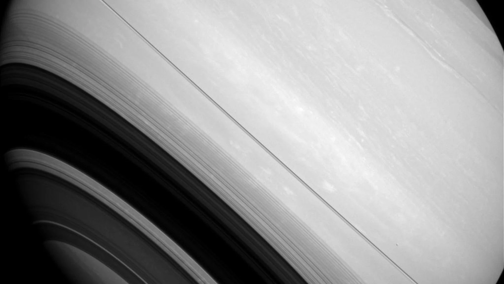 Circling Saturn - free hd space wallpaper for desktop