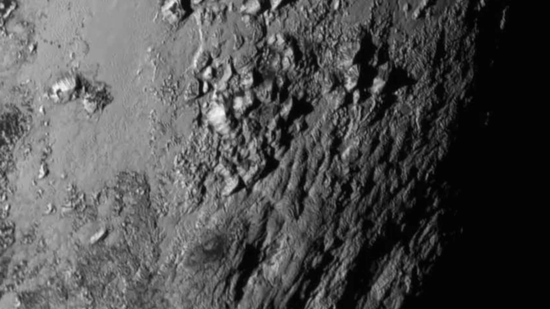 First Ever High Resolution View of Pluto's Surface - free hd space wallpaper for desktop