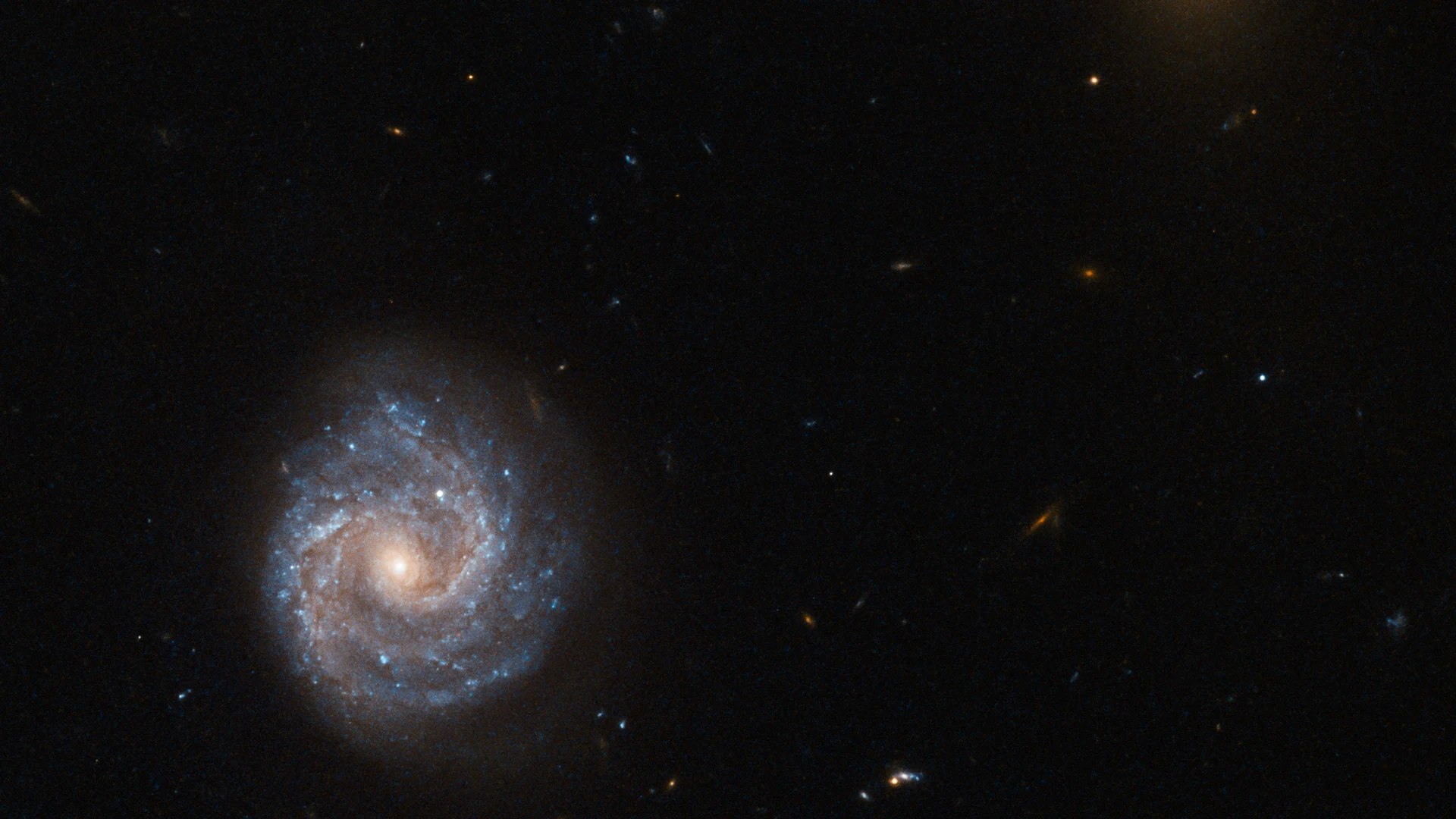 Hubble Eyes a Powerful Galaxy - free hd space wallpaper for desktop