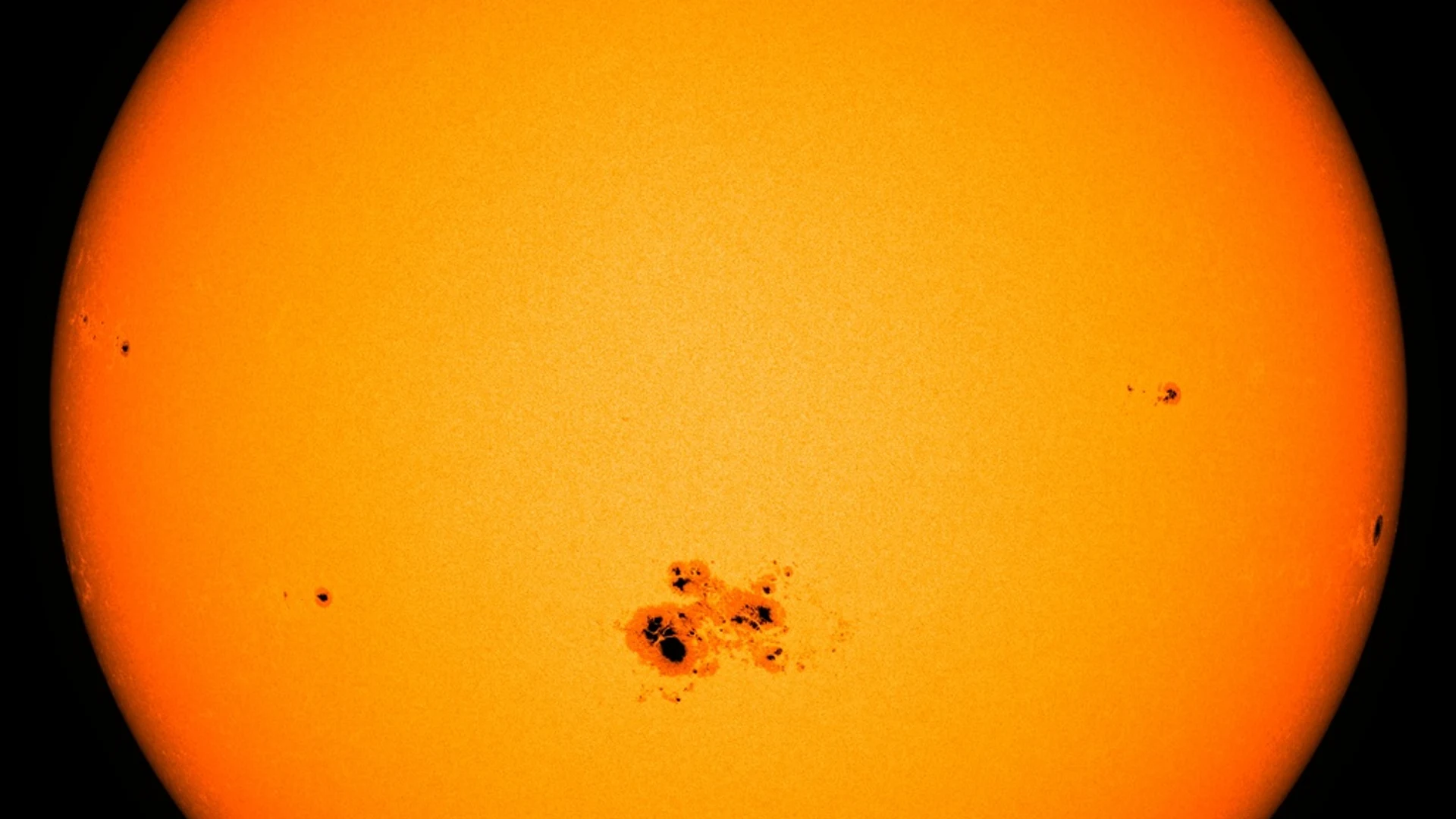 NASA's SDO Observes Largest Sunspot of the Solar Cycle - free hd space wallpaper for desktop