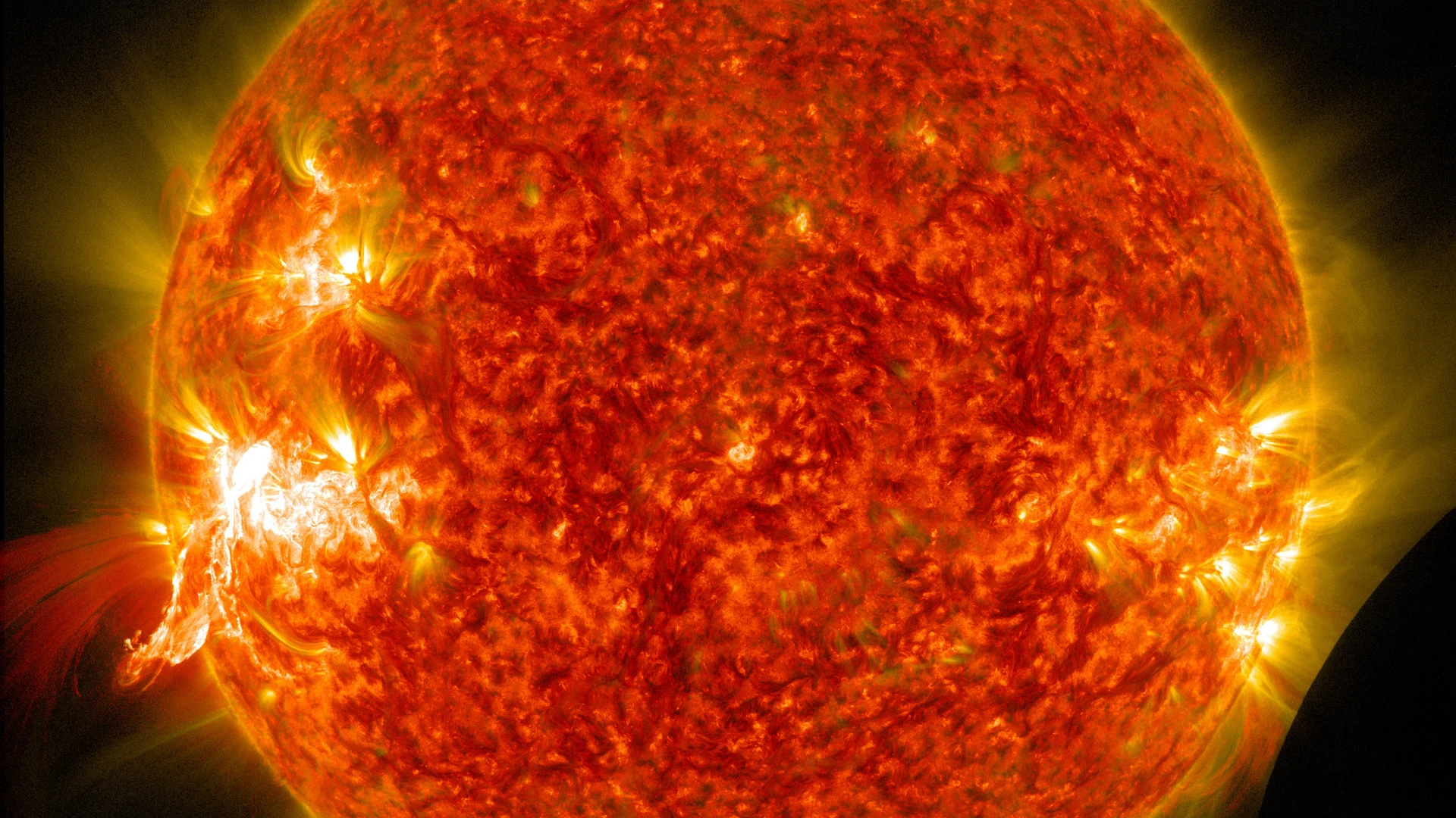 NASA's SDO Sees a Solar Flare and a Lunar Transit - free hd space wallpaper for desktop