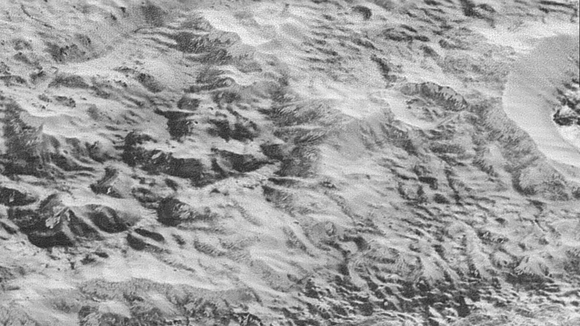 Pluto Badlands - free hd space wallpaper for desktop