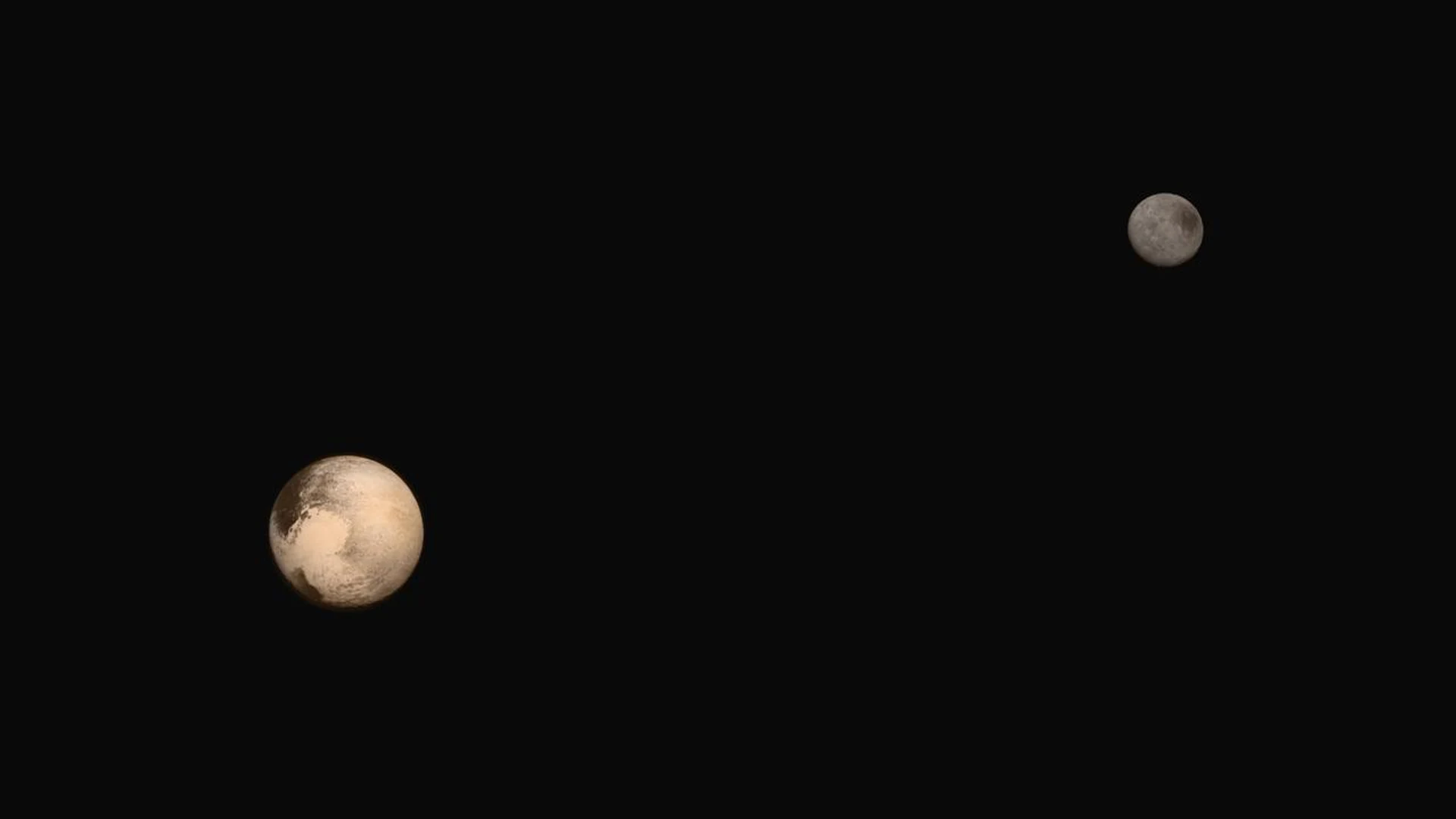 Portrait of Pluto and Charon - free hd space wallpaper for desktop