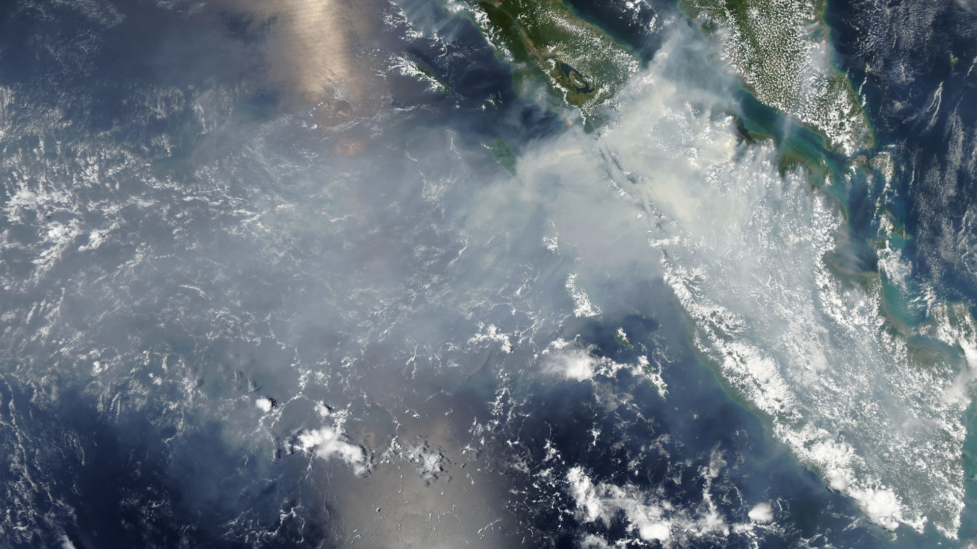 Smoke and fires from Sumatra - free hd space wallpaper for desktop