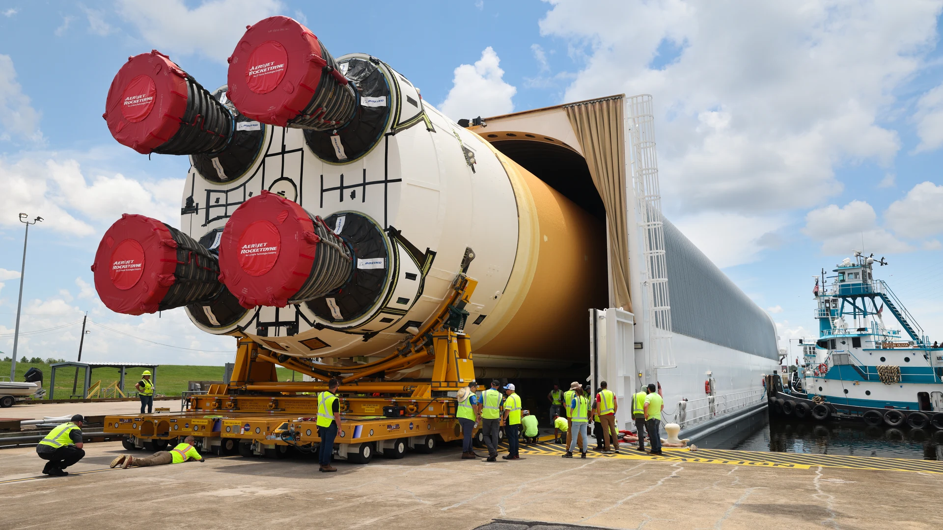 Space Launch System Core Stage for Artemis II Rocket Loaded onto Pegasus Barge - free hd space wallpaper for desktop