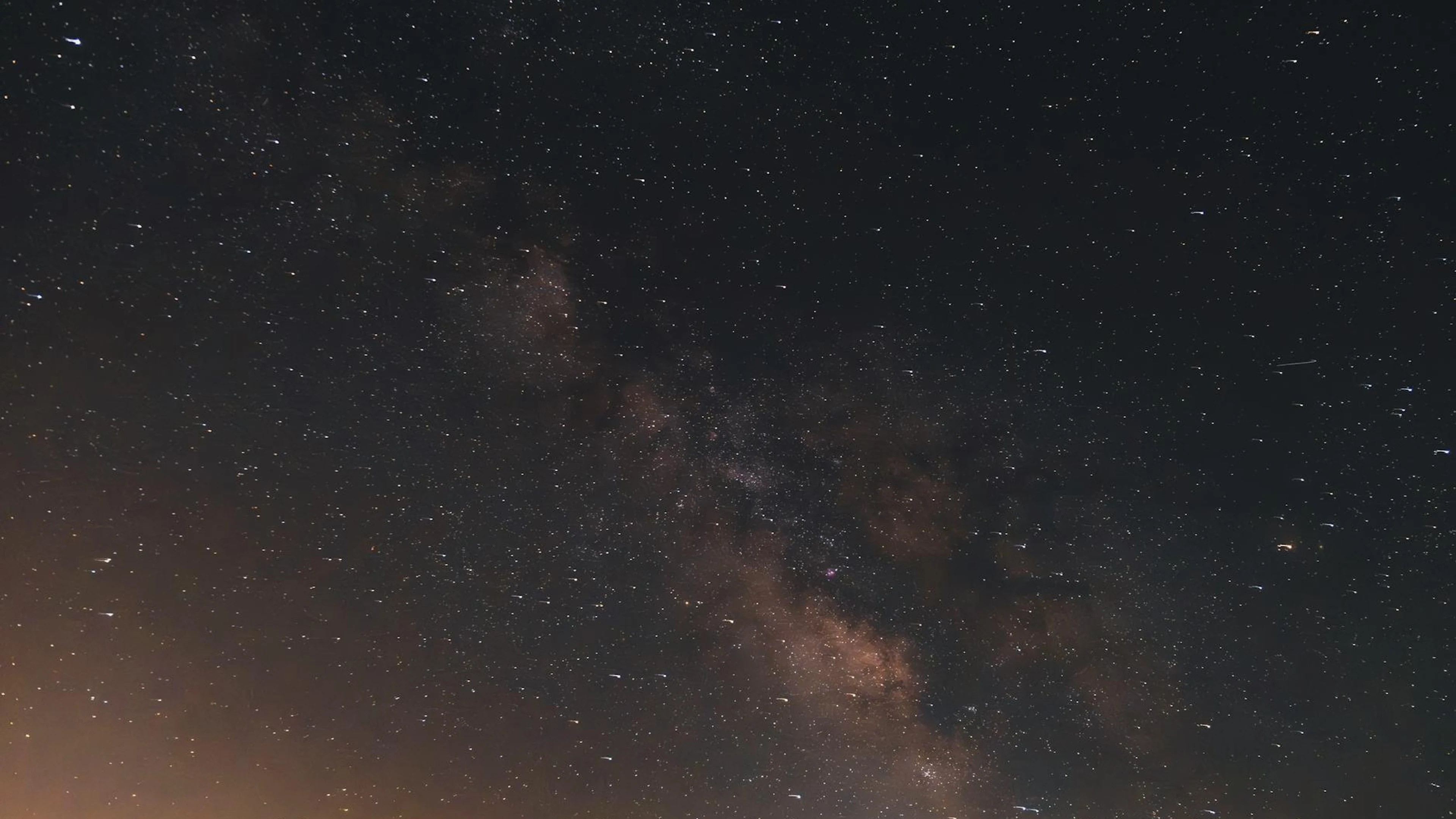 Stunning astrophotography of the Milky Way showcasing countless stars in a night - free 4K Ultra HD space wallpaper for desktop