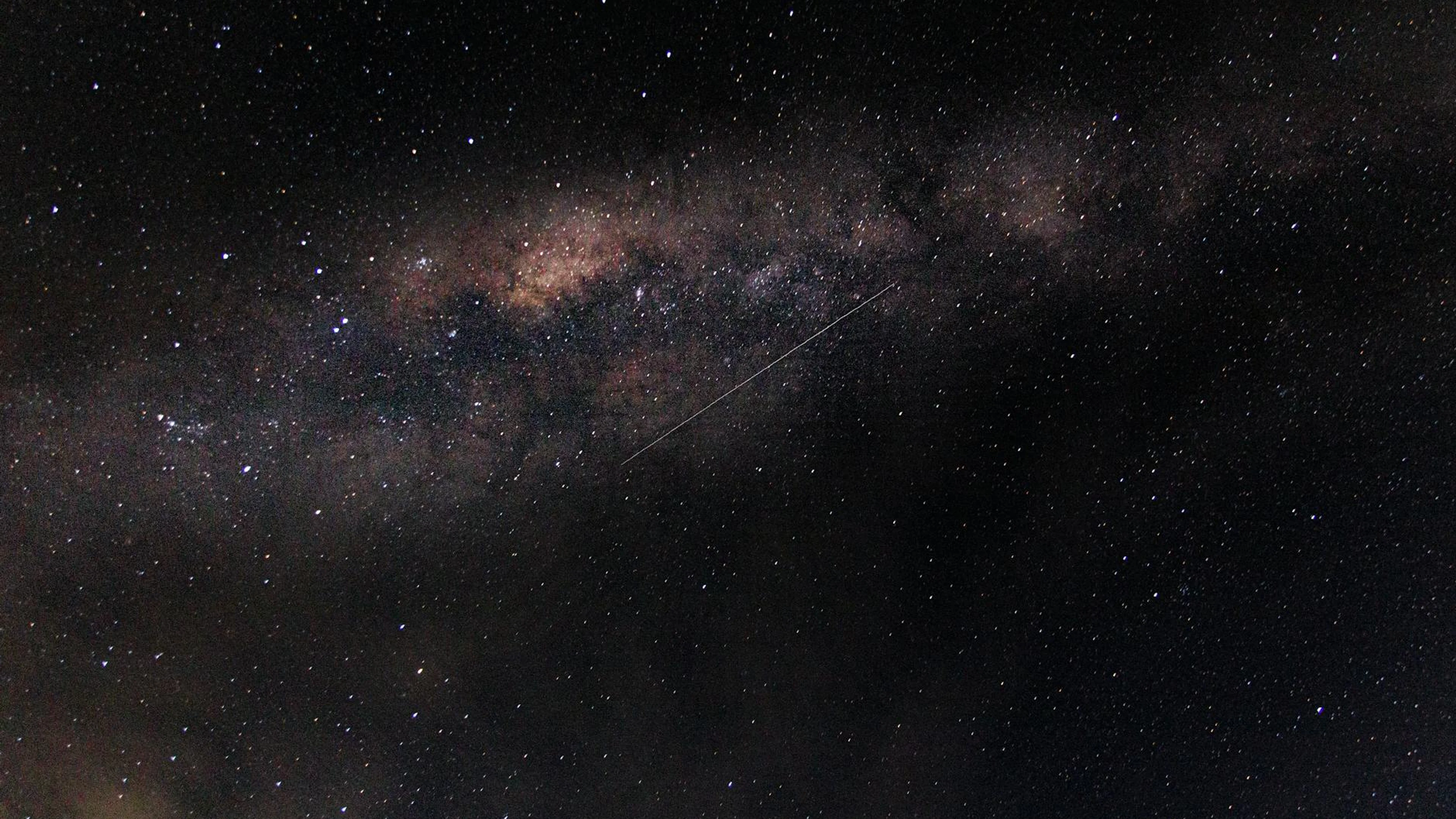 Stunning view of the Milky Way galaxy and stars on a clear night sky, perfect fo - free 4K Ultra HD space wallpaper for desktop