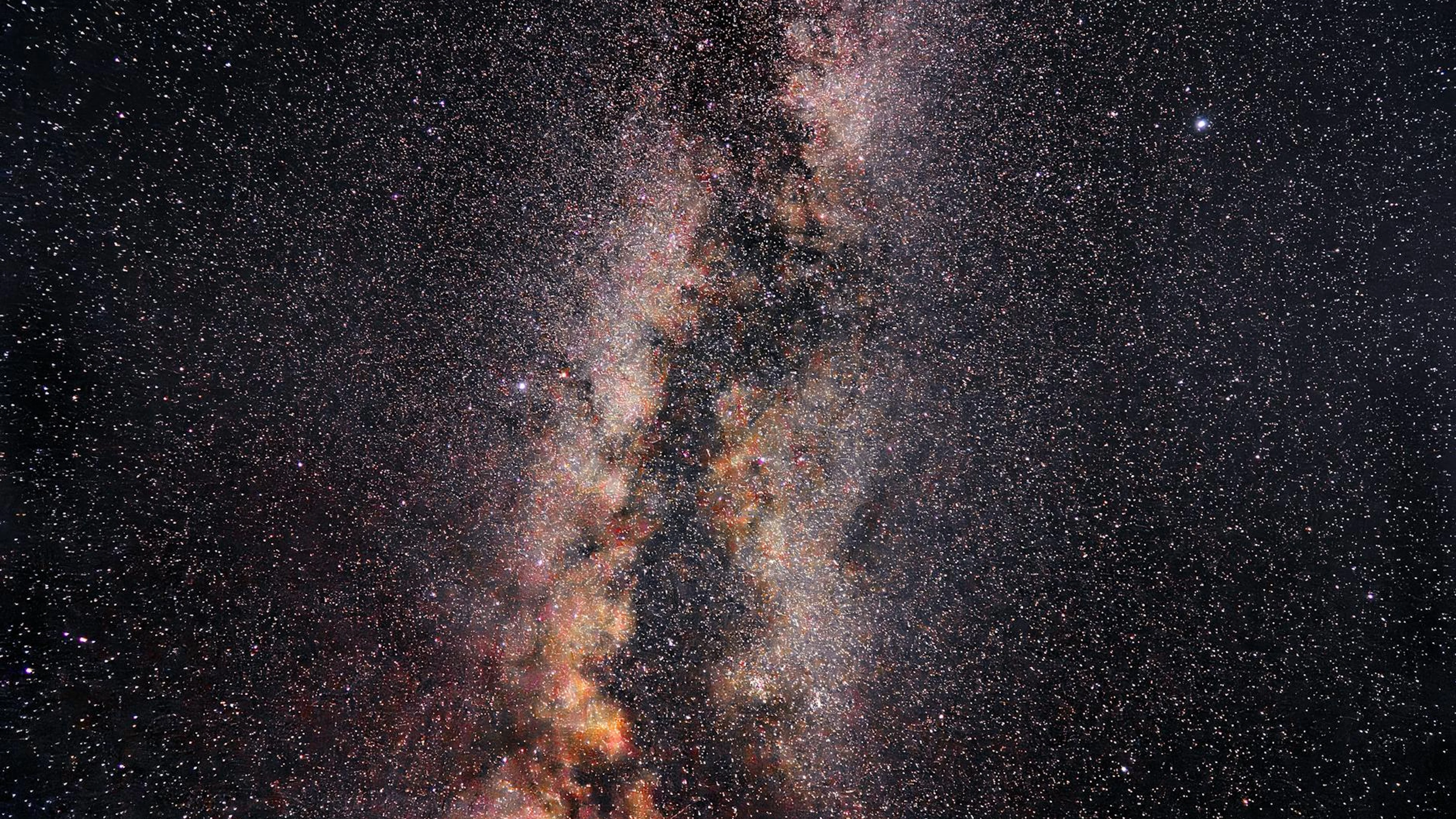 Stunning view of the Milky Way under a starry night sky in Joshua Tree, Californ - free 4K Ultra HD space wallpaper for desktop