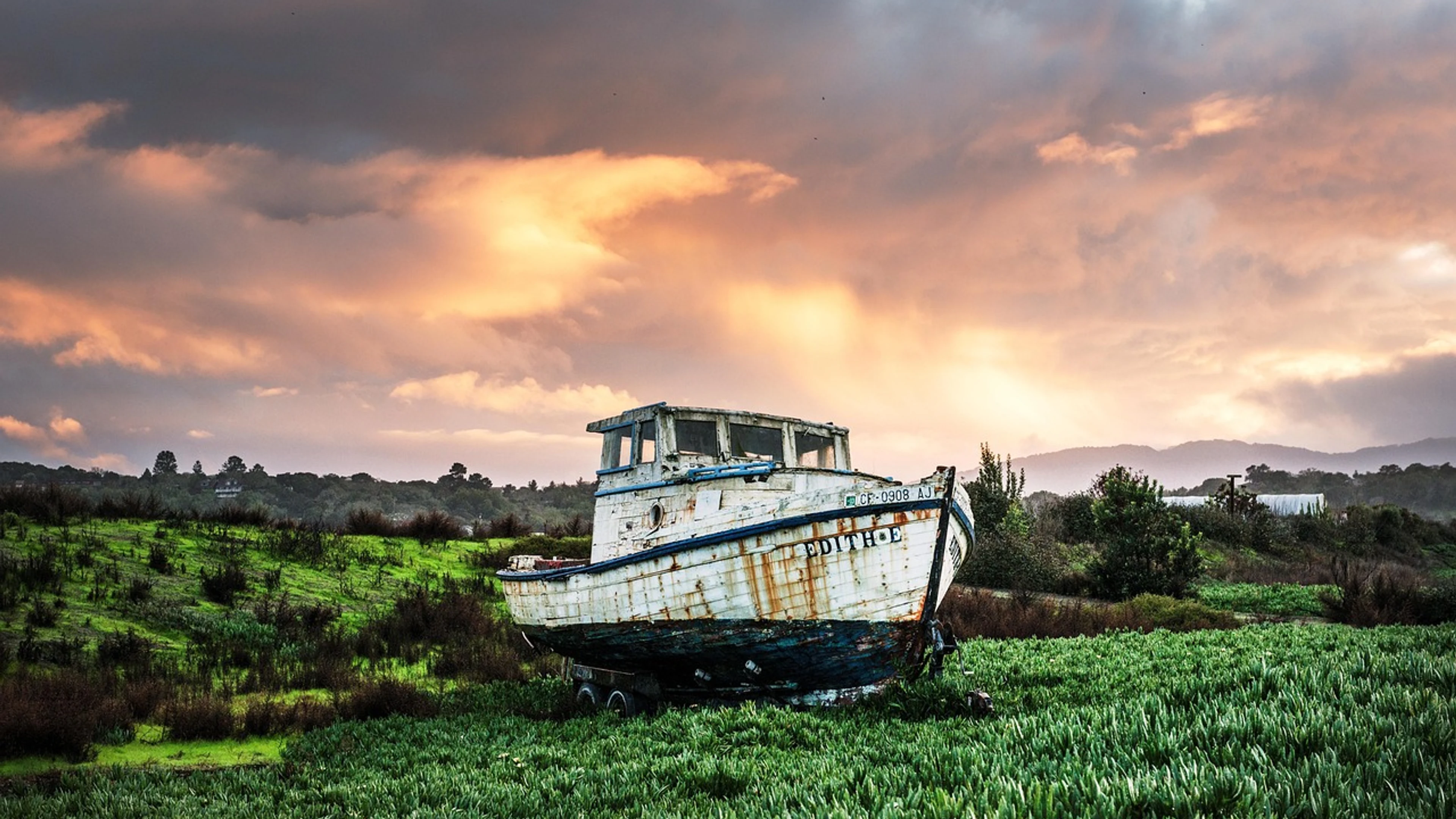 Fishing boat abandoned fields - free 4K Ultra HD sunset wallpaper for desktop